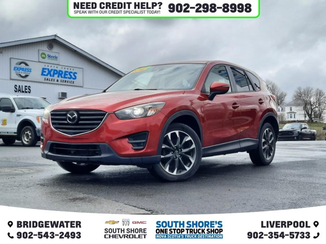 Recent Arrival! Red 2016 Mazda CX-5 Grand Touring For Sale, Bridgewater AWD 6-Speed Automatic SKYACTIV®-G 2.5L 4-Cylinder DOHC 16V 4-Wheel Disc Brakes, 9 Speakers, Air Conditioning, Alloy wheels, Automatic temperature control, Brake assist, CD player, Driver door bin, Dual front impact airbags, Dual front side impact airbags, Electronic Stability Control, Exterior Parking Camera Rear, Front anti-roll bar, Front dual zone A/C, Fully automatic headlights, Garage door transmitter: HomeLink, Heated door mirrors, Heated Front Seats, Leather Shift Knob, Leather Upholstery, Memory seat, Occupant sensing airbag, Outside temperature display, Passenger vanity mirror, Power door mirrors, Power moonroof, Power steering, Power windows, Rear window defroster, Rear window wiper, Security system, Speed-sensing steering, Split folding rear seat, Spoiler, Steering wheel mounted audio controls, Tachometer, Trip computer, Variably intermittent wipers. Reviews: * Sporty driving feel that makes you feel secure while cornering; engines earn great fuel economy; spacious seating in both rows; many desirable safety features. Source: Edmunds