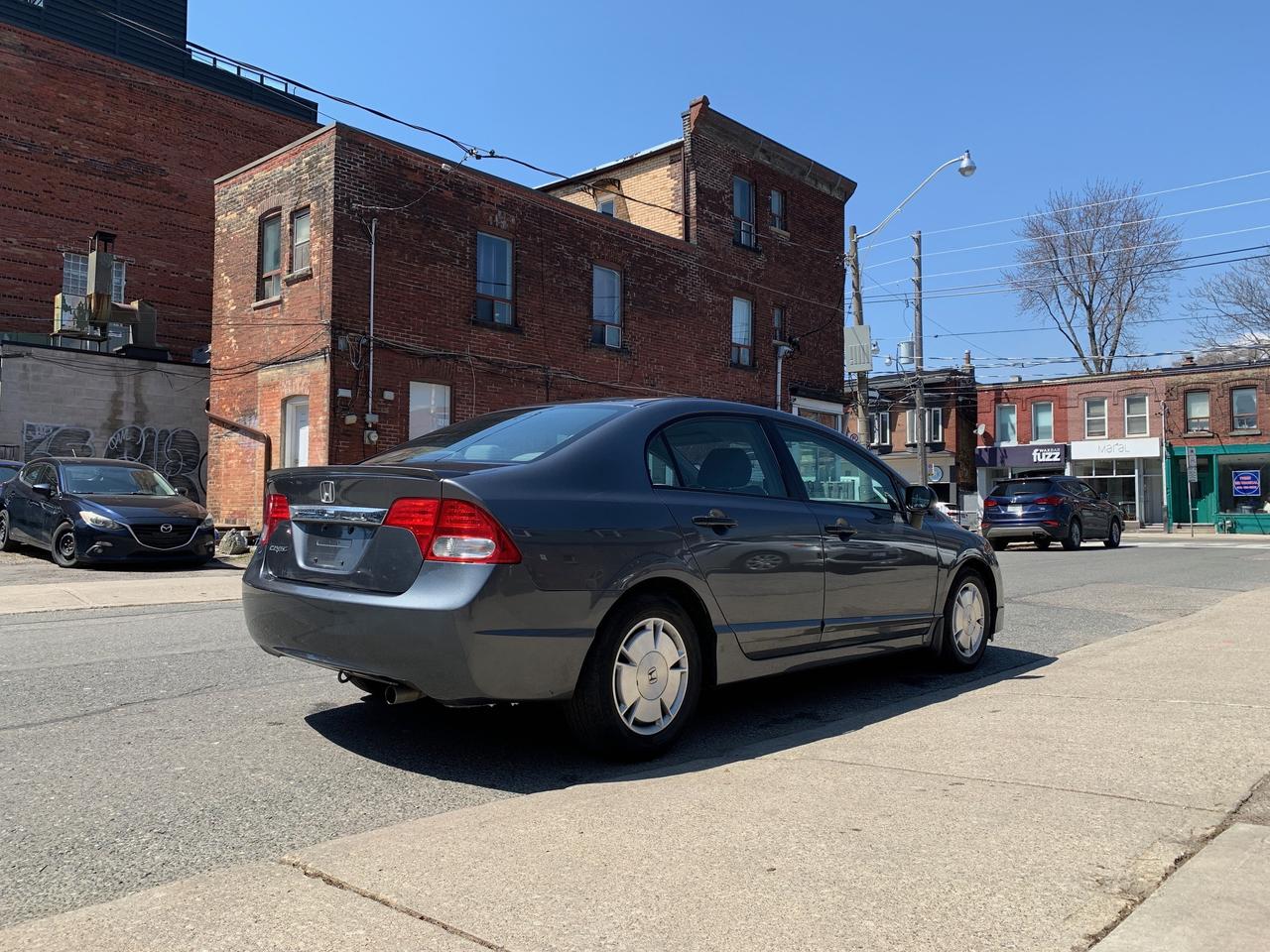 2009 Honda Civic 4dr Auto DX-G Photo