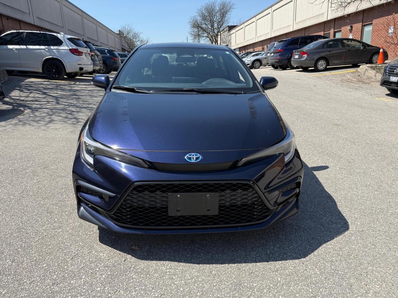 2025 Toyota Corolla Hybrid SE CVT AWD, SUNROOF, ALLOY WHEELS Photo