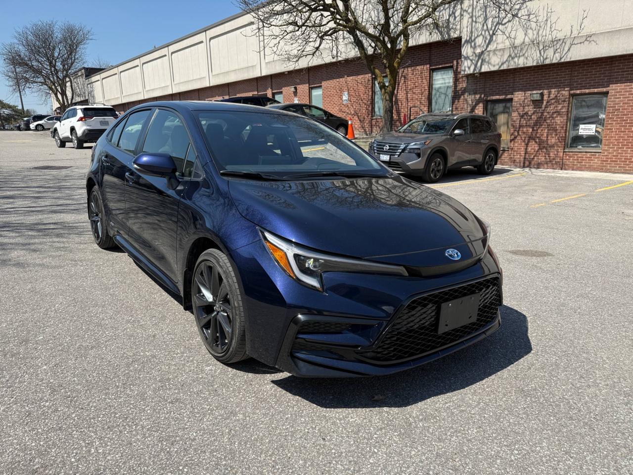 2025 Toyota Corolla Hybrid SE CVT AWD, SUNROOF, ALLOY WHEELS Photo