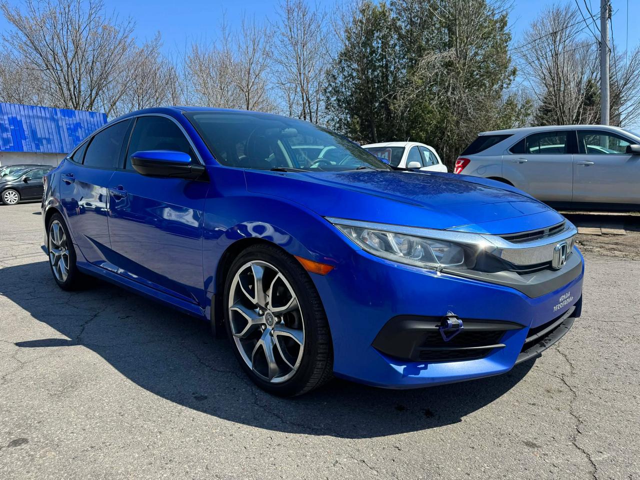 <p>Looking for a reliable and stylish sedan that offers great fuel economy and a comfortable ride? Check out this stunning 2016 Honda Civic 4dr CVT LX, available now at Stewart Auto Hub! This sleek blue beauty boasts a timeless design and is ready to hit the road. With its spacious interior featuring a dark grey interior and a fuel-efficient 2L 4-cylinder engine, this Civic is perfect for daily commutes, weekend getaways, and everything in between. This Civic has 178,656km on the odometer.</p><p>This Civic offers a fantastic driving experience with its smooth variable transmission, and front-wheel drive, ensuring confident handling in various road conditions. The sedans practical four-door design provides easy access for passengers and cargo, making it a versatile choice for individuals and families alike. Its a vehicle known for its longevity and dependability, giving you peace of mind for years to come.</p><p>***Price excludes taxes and licensing fees***</p><p>Here are some of the standout features of this 2016 Honda Civic:</p><ul><li><strong>Fuel-sipping Efficiency:</strong> The 2L 4-cylinder engine is renowned for its excellent fuel economy, saving you money at the pump.</li><li><strong>Smooth CVT Transmission:</strong> Enjoy seamless acceleration and a comfortable ride with the advanced continuously variable transmission.</li><li><strong>Spacious Interior:</strong> The four-door design and ample cabin space provide plenty of room for both passengers and cargo.</li><li><strong>Reliable Honda Engineering:</strong> Known for its dependability, Honda vehicles are built to last.</li><li><strong>Stylish Design:</strong> The blue exterior and modern sedan shape ensure youll turn heads wherever you go.</li></ul><p>STEWART AUTO HUB</p><p>421 KING STREET EAST</p><p>COBOURG, ON</p><p>905-269-5995</p><p><strong><em>Powered by AutoIntelligence&trade;</em></strong> Vehicle information has been generated using artificial intelligence and is provided for informational purposes only. While efforts are made to ensure accuracy, please confirm all details directly with the dealer.</p>