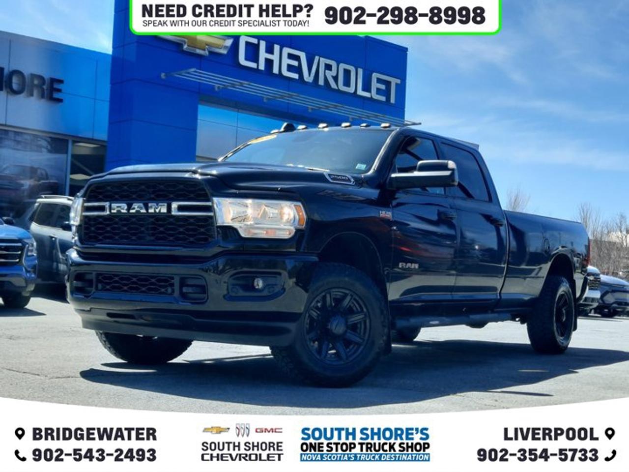 Recent Arrival! Diamond Black Crystal Pearlcoat 2022 Ram 2500 Big Horn 4WD 8-Speed Automatic HEMI 115-Volt Auxiliary Power Outlet - Front, 115-Volt Auxiliary Power Outlet - Rear, 115V Auxiliary Power Outlet - Exterior, 18 x 8 Polished Aluminum Wheels, 2 Red Vinyl Flags, 2-Way Rear Headrests, 220-Amp Alternator, 2nd Row In-Floor Storage Bins, 3 Reflecting Triangles, 4-Way Adjustable Front Headrests, 400-Watt Inverter, 5th Wheel/Gooseneck Towing Prep Group, 6 Speakers, 7 Customizable In-Cluster Display, A/C w/Dual-Zone Auto Temp Control, ABS brakes, Air Conditioning, Air Suspension Decal, AM/FM radio: SiriusXM, Auto-Dimming Rear-View Mirror, Big Horn Instrument Panel Badge, Black Interior Accents, Block heater, Body-Colour Door Handles, Body-Colour Front Bumper, Body-Colour Grille Surround, Centre Hub, Centre Stack Storage Drawer, Compass, Dampened Tailgate, Delay-off headlights, DOT Fire Extinguisher, DOT-Certified Roadside Safety Kit, Dual front side impact airbags, Dual Glove Boxes, Electronic Stability Control, Electronically Controlled Throttle, Fog Lamps, Fold-Flat Load Floor w/Storage, Footwell Courtesy Lamp, Front 40/20/40 Split Bench Seat, Front anti-roll bar, Front Armrest w/Cupholders, Front Centre Seat Cushion Storage, Front Heated Seats, Front Seatback Map Pockets, Fully automatic headlights, Glove Box Lamp, Heated door mirrors, Heated Steering Wheel, Heavy-Duty Snowplow Prep Group, Illuminated entry, Leather-Wrapped Steering Wheel, LED Bed Lighting, LED Taillamps, Level C Equipment Group, Locking Lower Glove Box, Low tire pressure warning, Manual 4-Way Adjustable Passenger Seat, Media Hub w/2 USB Charging Ports, Occupant sensing airbag, Painted Rear Bumper, Panic alarm, Park-Sense Front & Rear Park Assist, ParkView Rear Back-Up Camera, Power 2-Way Driver Lumbar Adjust, Power 8-Way Adjustable Driver Seat, Power Adjustable Pedals, Power door mirrors, Power steering, Power windows, Premium Cloth Front 40/20/40 Bench, Quick Order Package 2GZ, Radio data system, Rear 60/40 Split Folding Bench Seat, Rear Dome Lamp w/On/Off Switch, Rear Power Sliding Window, Rear step bumper, Rear Window Defroster, Remote Start System, Security Alarm, Spare Fuses, Sport Appearance Package, Sport Decal, Steering Wheel Mounted Audio Controls, Storage Tray, Sun Visors w/Illuminated Vanity Mirrors, Tachometer, Tip Start, Traction control, Universal Garage Door Opener, Variably intermittent wipers.