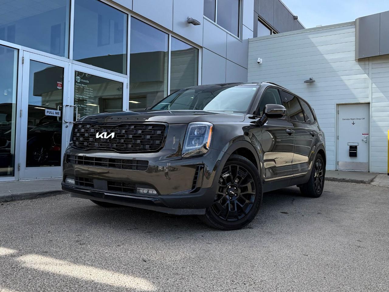 Discover the 2022 Kia Telluride NightSky AWD  a stunning blend of style, power, and luxury in Dark Moss exterior with sleek black Nappa leather interior. Powered by a robust 3.8L V6 engine paired with an 8-speed automatic transmission, this SUV delivers smooth, confident performance with capable all-wheel drive for any adventure.Enjoy premium comfort with heated and air-cooled front captains seats, 20 black alloy wheels, dual sunroof, and advanced tech including a 12.3-inch touchscreen with integrated navigation and Level 2 partial automation. Safety is paramount with 7 airbags, blind spot and lane departure assist, forward collision mitigation, and an aerial view camera.With spacious seating for 7, multiple USB ports, wireless charging, and thoughtful convenience features like a power liftgate and tri-zone climate control, the Telluride NightSky keeps every passenger comfortable and connected.Elevate your drive  experience the perfect balance of performance, luxury, and cutting-edge safety in this pre-owned 2022 Kia Telluride NightSky AWD. Schedule your test drive today!Go Mazda is an AMVIC licensed businessThis vehicle has been registered in the province ofOntario and is showing a CarFax incident in the amount of $4,147.00