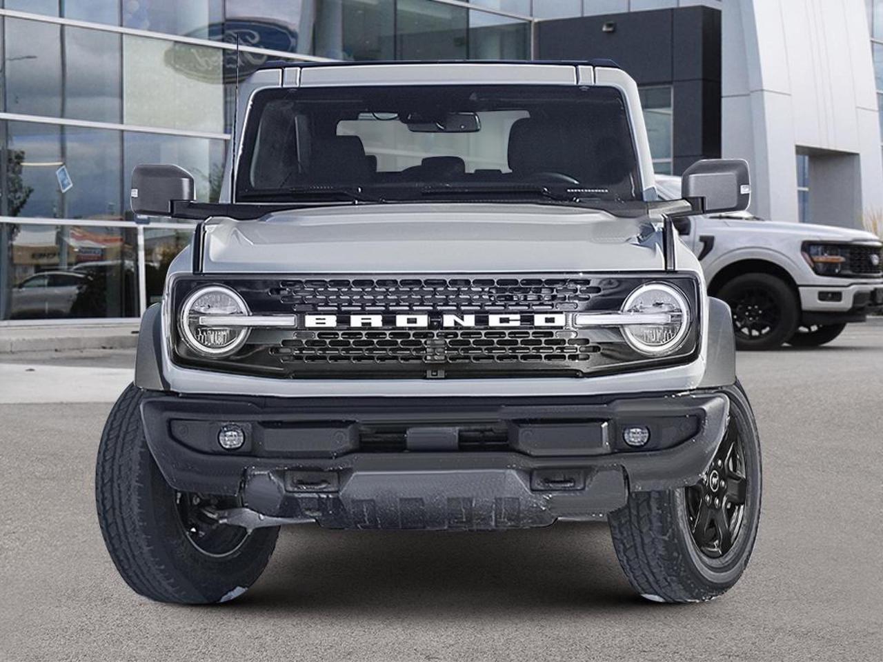 The 2026 Ford Bronco Outer Banks is built for those who want genuine off-road capability without sacrificing everyday comfort. With a capable 2.7L V6, 4WD drivetrain, and a removable convertible top, this Bronco is ready for wherever the road  or lack thereof  takes you. Brand new with only 100 km, its fresh off the lot and waiting for its first real adventure.

Key Features:
- 2.7L 6-cylinder engine with Part-Time 4WD  serious trail-ready performance
- Manual convertible top with fixed roll-over protection for open-air driving
- Heated leather-wrapped steering wheel with integrated cruise controls
- Voice-activated dual-zone automatic climate control for front passengers
- Connected Navigation with live traffic, predictive routing, and pinch-to-zoom
- Leather/leatherette rear seating with 60/40 split-fold configuration
- Side steps and body-coloured heated power mirrors for a refined exterior look
- Fuel economy of 11.7 L/100 km highway and 12.7 L/100 km city

Safety & Driver Assistance:
- BLIS Blind Spot Information System with Cross-Traffic Alert
- Ford Co-Pilot360 with automatic high-beam headlamps
- Driver Monitoring Alert and Collision Mitigation (Front)
- Full airbag suite including curtain, side, and front airbags
- Back-up camera and rear child safety locks

Ready to take the next step? Reserve this Bronco online, start your purchase, or book a test drive at Birchwood Ford. Have questions? Our team is here to help  reach us at www.birchwoodford.ca or come visit us in person.
Birchwood Ford is your choice for New Ford vehicles in Winnipeg. 

At Birchwood Ford, we hold ourselves to the highest standard. Our number one focus is customer satisfaction which has awarded us the Ford of Canadas Presidents Award for 5 consecutive years. This honour is presented to Ford dealers that have proven outstanding results in Sales and Customer Service Excellence.

Are you a newcomer to Canada, recent graduate, first time car buyer or physically challenged? Ask us about our exclusive rebates and how they may apply to you.
 
Interested in seeing/hearing more? Book a test drive or give us a call at (204) 661-9555 and we can help you with whatever you need!

Dealer permit #4454
Dealer permit #4454