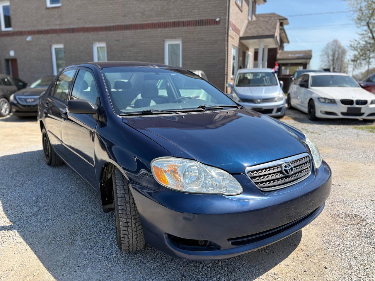 <p><strong>2007 Toyota Corolla  Fully Reconditioned | Safety Included | 1-Year Powertrain Warranty</strong></p><p>Reliable and fuel-efficient <strong>2007 Toyota Corolla</strong> that has been <strong>completely reconditioned</strong> and prepared for the road. Known for long-term durability</p><p>The vehicle comes <strong>Ontario safety certified and ready for the road</strong>, with a <strong>1-Year Powertrain Warranty included</strong>.</p><p> Fully reconditioned<br> Safety certified<br> 1-Year Powertrain Warranty included<br> Very reliable and fuel-efficient</p><p><strong>Recent maintenance and reconditioning</strong></p><p>New K-frame installed<br>New muffler and resonator<br>New brake pads and rotors all around<br>Underbody rust protection applied<br>Fully inspected and safety ready</p><p><strong>Condition and driving</strong></p><p>Drives very smooth and comfortable<br>Well maintained and properly serviced<br>Clean and ready for everyday use<span id=jodit-selection_marker_1776966689388_6349943985455517 data-jodit-selection_marker=start style=line-height: 0; display: none;></span></p><p><strong>Warranty</strong></p><p>1-Year Powertrain Warranty Included</p><p>Coverage includes major components such as:</p><p> Engine<br> Transmission<br> Differential</p><hr><p><strong>AUTO NATION CAR SALES & SERVICES</strong><br>9300 Tecumseh Rd. East, Windsor, ON N8R 1A2<br>Call or Text: 226-246-2429</p><p>We accept Debit / Visa / Mastercard / AMEX.<br>All-in pricing (plus HST & licensing only).</p>