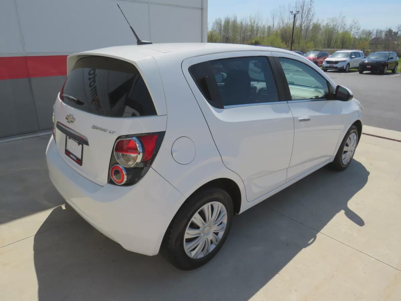 2013 Chevrolet Sonic LT | Sunroof | Automatic | Fog Lights | Power Doors and Locks | A/C | Cruise Control | Bluetooth | Digital Screen | Photo