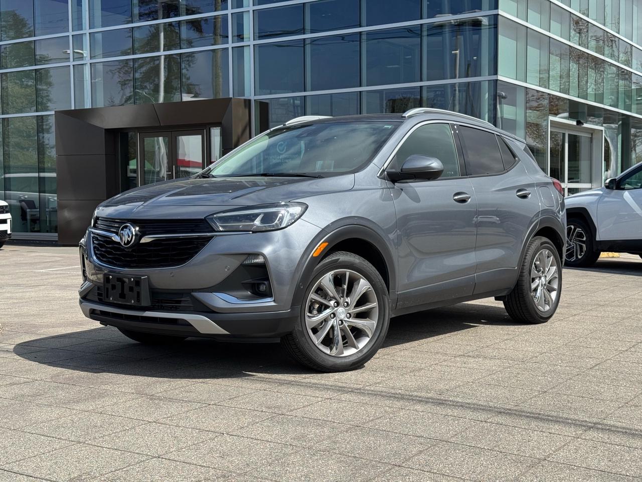 Leather Interior | Panoramic Sunroof | Head Up Display | Navigation | AWD | Heated Seats & Steering Wheel | Apple CarPlay & Android Auto | No Accidents | One Owner<br><br>2022 Buick Encore GX Essence AWD<br><br>This 2022 Buick Encore GX Essence AWD in Satin Steel Gray Metallic is now available at White Rock Hyundai, offering a premium compact SUV with exceptionally low kilometres. With just 29,100 km over 38,000 km below market average, this well maintained vehicle comes with service records and delivers a smooth, efficient drive powered by a turbocharged 1.3L engine paired with a 9 speed automatic transmission and all wheel drive. Perfect for commuting around White Rock, Surrey, Langley, and the Lower Mainland, this Encore GX combines comfort, efficiency, and confidence.<br><br>As the Essence trim, this Encore GX features a refined leather interior with upscale touches throughout. Enjoy premium features like a panoramic sunroof, head up display, navigation, Apple CarPlay, Android Auto, and dual zone climate control. Heated seats and a heated steering wheel add comfort, while advanced safety features including forward collision alert enhance peace of mind. With its compact size, premium feel, and ultra low kilometres, this SUV is a standout option. If youre searching for a used Buick Encore GX for sale in White Rock, this AWD Essence offers exceptional value.<br><br>Odometer is 38065 kilometers below market average!<br><br>Awards:<br>  * 2022 IIHS Top Safety Pick with specific headlights<br><br>Why Buy From White Rock Hyundai?<br>* 7x Hyundai Presidents Award of Merit Winner<br>* 3x Consumer Choice Award for Business Excellence<br>* AutoTrader Dealer of the Year<br><br>M-Promise Certified Pre-Owned ($995 value) includes:<br>* 30-day / 2,000 km Exchange Program<br>* 3-day / 300 km Money Back Guarantee<br>* Comprehensive 144-Point Mechanical Inspection<br>* Full Synthetic Oil Change<br>* BC Verified CARFAX<br>* Minimum 6 Month Powertrain Warranty<br><br>Buy with confidence at White Rock Hyundai. Our vehicles are priced competitively based on market demand, condition, and kilometres to give our customers a transparent and hassle-free buying experience.<br><br>Visit White Rock Hyundai today to test drive this 2022 Buick Encore GX Essence AWD. We proudly serve drivers in White Rock, South Surrey, Surrey, Delta, Langley, and Vancouver with quality pre-owned vehicles and a professional, no-pressure experience.<br><br>Contact our team today to confirm availability, explore financing options, and reserve this vehicle.<br><br>* All vehicle purchases are subject to a $799 administration fee. Dealer #31129.