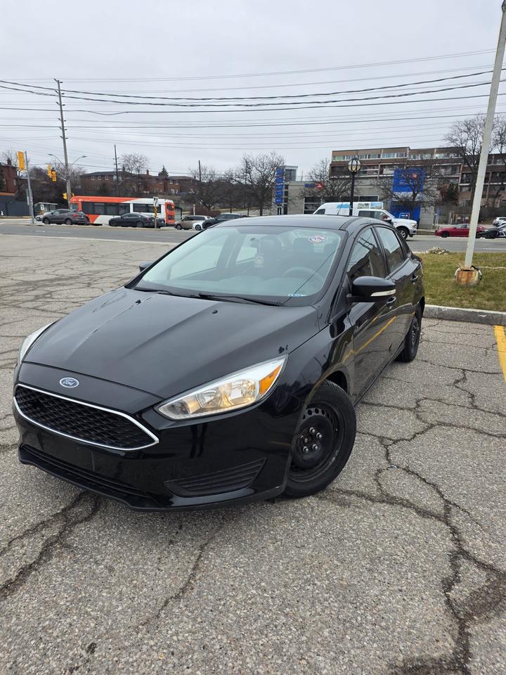 <p class=MsoNormal>READY TO CERTIFY &ndash; 2015 FORD FOCUS<br><strong>ALL-INCLUSIVE PRICE &ndash; SAFETY, TAXES, LICENSING & ONE YEAR FREE WARRANTY INCLUDED</strong><br><strong>NO HIDDEN FEES &ndash; PAY & DRIVE</strong></p><p class=MsoNormal>ONE OWNER<br>LOW MILEAGE &ndash; ONLY 170,000 KM<br>EXCELLENT CONDITION INSIDE & OUT<br><strong>ONE YEAR FREE WARRANTY &ndash; ENGINE, TRANSMISSION & DIFFERENTIAL</strong><br>2.0L 4-CYLINDER ENGINE<br>AUTOMATIC TRANSMISSION<br>FRONT WHEEL DRIVE (FWD)<br>POWER & HEATED FRONT SEATS<br>BLUETOOTH CONNECTIVITY<br>CRUISE CONTROL<br>REMOTE KEYLESS ENTRY<br>POWER WINDOWS<br>POWER LOCKS<br>REARVIEW CAMERA<br>STEERING WHEEL CONTROLS<br>AM/FM/USB/AUX<br>60/40 SPLIT FOLDING REAR SEATS<br>TILT & TELESCOPIC STEERING WHEEL<br>ALLOY WHEELS<br>TPMS SYSTEM<br>TRACTION CONTROL<br>STABILITY CONTROL<br>ABS BRAKES<br>DUAL FRONT, SIDE & CURTAIN AIRBAGS<br>BOOKS & MANUALS INCLUDED</p><p class=MsoNormal><strong>FINAL PRICE INCLUDES SAFETY, TAXES, LICENSING & ONE YEAR FREE WARRANTY.</strong><br><strong>NO EXTRA FEES. NO SURPRISES.</strong></p><p class=MsoNormal>VICTORY MOTORS, A CERTIFIED DEALERSHIP BY OMVIC & UCDA MEMBER WILL PROUDLY SERVE YOU<br>FINANCE AVAILABLE FOR ALL CREDIT TYPES.<br>PLEASE CALL FOR FURTHER INQUIRIES, TEST DRIVE, OR VISIT OUR WEBSITE</p><p class=MsoNormal><span style=font-family: Segoe UI Emoji,sans-serif; mso-bidi-font-family: Segoe UI Emoji;>🌐</span> <a href=http://WWW.VICTORYMOTORS.CA target=_new>WWW.VICTORYMOTORS.CA</a><br><span style=font-family: Segoe UI Emoji,sans-serif; mso-bidi-font-family: Segoe UI Emoji;>📞</span> +1 437 962 7777<br><span style=font-family: Segoe UI Emoji,sans-serif; mso-bidi-font-family: Segoe UI Emoji;>📍</span> UNIT 38, 1000 DUNDAS ST E. MISSISSAUGA, L4Y 2B8</p><p class=MsoNormal>&nbsp;</p>
