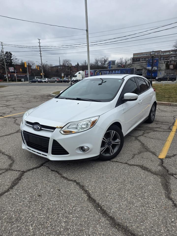 <p class=MsoNormal><strong>READY TO SELL &ndash; 2014 FORD FOCUS SE HATCHBACK</strong><br><strong>ALL-INCLUSIVE PRICE &ndash; TAXES & LICENSING INCLUDED</strong><br><strong>NO HIDDEN FEES &ndash; PAY & DRIVE &ndash; PRICE IS FIRM</strong></p><p class=MsoNormal><strong>ONE OWNER</strong></p><p class=MsoNormal><strong>SOLD AS-IS</strong><br><br>AM/FM/CD/USB/AUX AUDIO SYSTEM WITH BLUETOOTH CONNECTIVITY <br>CRUISE CONTROL<br>REMOTE KEYLESS ENTRY<br>2 KEYS<br>POWER WINDOWS<br>POWER LOCKS<br>STEERING WHEEL CONTROLS</p><p class=MsoNormal><strong>THIS VEHICLE IS SOLD AS-IS, WITH NO WARRANTY OR SAFETY INCLUDED.</strong><br><strong>AS PER OMVIC REGULATIONS, THIS VEHICLE MAY NOT BE ROADWORTHY AND MAY REQUIRE REPAIRS AT THE BUYER&rsquo;S EXPENSE.</strong></p><p class=MsoNormal><strong>FINAL PRICE INCLUDES TAXES & LICENSING.</strong><br><strong>NO EXTRA FEES. NO SURPRISES. PRICE IS NOT NEGOTIABLE.</strong></p><p class=MsoNormal><strong>VICTORY MOTORS, A CERTIFIED DEALERSHIP BY OMVIC & UCDA MEMBER WILL PROUDLY SERVE YOU</strong><br>PLEASE CALL FOR FURTHER INQUIRIES, TEST DRIVE, OR VISIT OUR WEBSITE</p><p><span style=font-size: 12.0pt; line-height: 115%; font-family: Segoe UI Emoji,sans-serif; mso-fareast-font-family: Aptos; mso-fareast-theme-font: minor-latin; mso-bidi-font-family: Segoe UI Emoji; mso-ansi-language: EN-US; mso-fareast-language: EN-US; mso-bidi-language: AR-SA;>🌐</span><span style=font-size: 12.0pt; line-height: 115%; font-family: Aptos,sans-serif; mso-ascii-theme-font: minor-latin; mso-fareast-font-family: Aptos; mso-fareast-theme-font: minor-latin; mso-hansi-theme-font: minor-latin; mso-bidi-font-family: Times New Roman; mso-bidi-theme-font: minor-bidi; mso-ansi-language: EN-US; mso-fareast-language: EN-US; mso-bidi-language: AR-SA;> <strong><a href=http://WWW.VICTORYMOTORS.CA target=_new>WWW.VICTORYMOTORS.CA</a></strong><br></span><span style=font-size: 12.0pt; line-height: 115%; font-family: Segoe UI Emoji,sans-serif; mso-fareast-font-family: Aptos; mso-fareast-theme-font: minor-latin; mso-bidi-font-family: Segoe UI Emoji; mso-ansi-language: EN-US; mso-fareast-language: EN-US; mso-bidi-language: AR-SA;>📞</span><span style=font-size: 12.0pt; line-height: 115%; font-family: Aptos,sans-serif; mso-ascii-theme-font: minor-latin; mso-fareast-font-family: Aptos; mso-fareast-theme-font: minor-latin; mso-hansi-theme-font: minor-latin; mso-bidi-font-family: Times New Roman; mso-bidi-theme-font: minor-bidi; mso-ansi-language: EN-US; mso-fareast-language: EN-US; mso-bidi-language: AR-SA;> <strong>+1 437 962 7777</strong><br></span><span style=font-size: 12.0pt; line-height: 115%; font-family: Segoe UI Emoji,sans-serif; mso-fareast-font-family: Aptos; mso-fareast-theme-font: minor-latin; mso-bidi-font-family: Segoe UI Emoji; mso-ansi-language: EN-US; mso-fareast-language: EN-US; mso-bidi-language: AR-SA;>📍</span><span style=font-size: 12.0pt; line-height: 115%; font-family: Aptos,sans-serif; mso-ascii-theme-font: minor-latin; mso-fareast-font-family: Aptos; mso-fareast-theme-font: minor-latin; mso-hansi-theme-font: minor-latin; mso-bidi-font-family: Times New Roman; mso-bidi-theme-font: minor-bidi; mso-ansi-language: EN-US; mso-fareast-language: EN-US; mso-bidi-language: AR-SA;> <strong>UNIT 38, 1000 DUNDAS ST E., MISSISSAUGA, L4Y 2B8</strong></span></p>