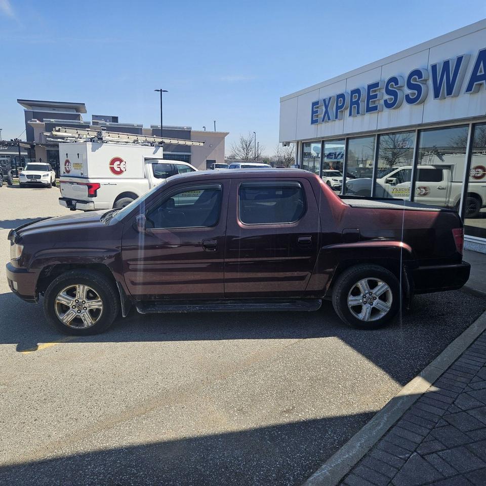 2010 Honda Ridgeline LOCAL TRADE, V6, LEATHER, MOON, EX-L, AS TRADED! Photo