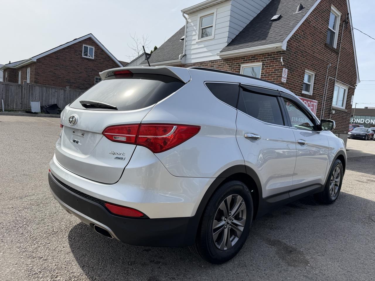 2014 Hyundai Santa Fe Sport Premium | Two Sets of Wheels Photo