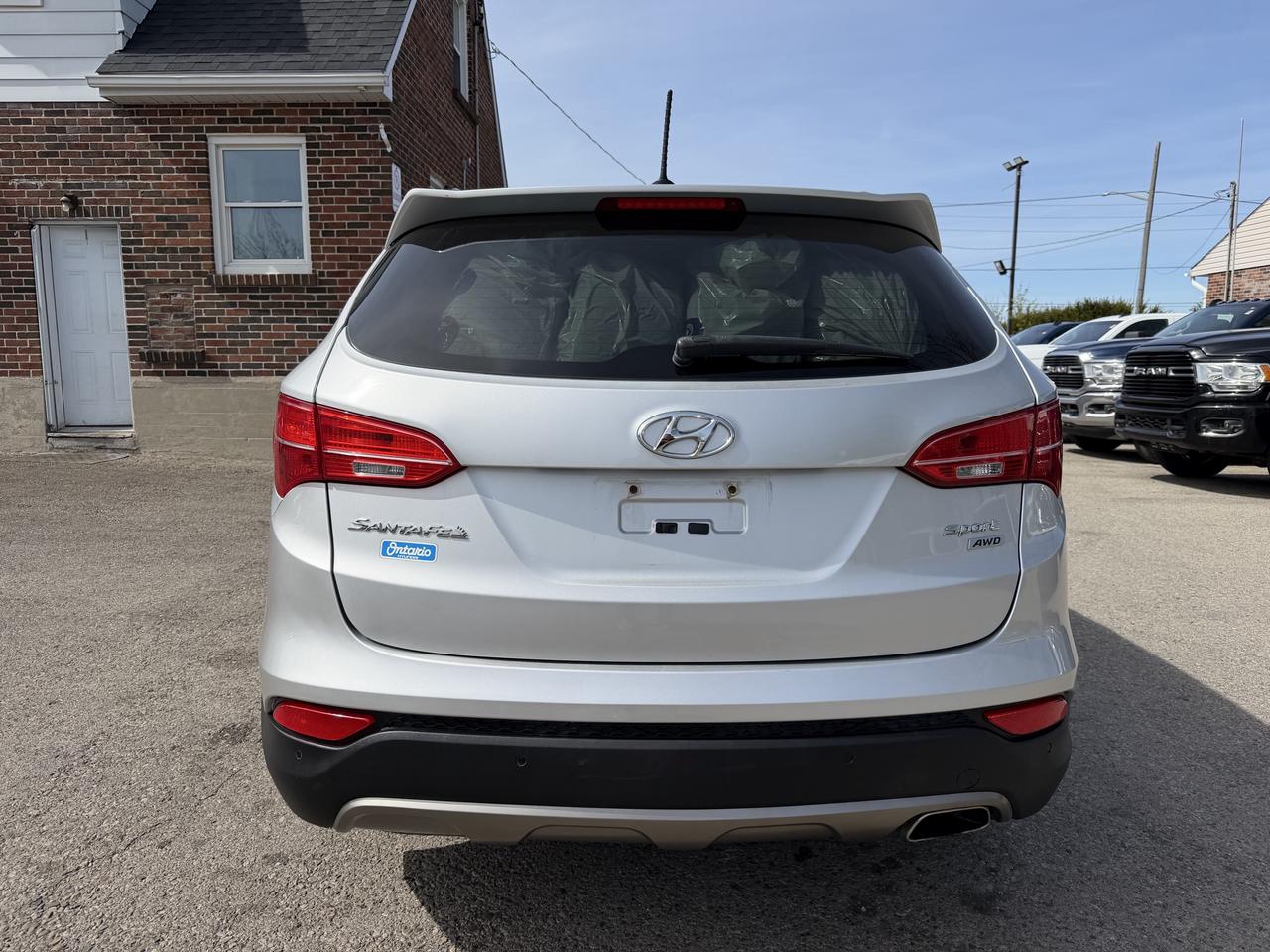 2014 Hyundai Santa Fe Sport Premium | Two Sets of Wheels Photo