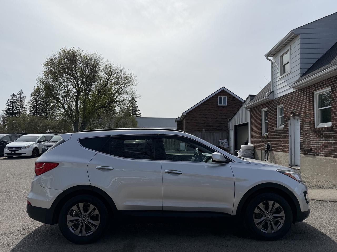 2014 Hyundai Santa Fe Sport Premium | Two Sets of Wheels Photo