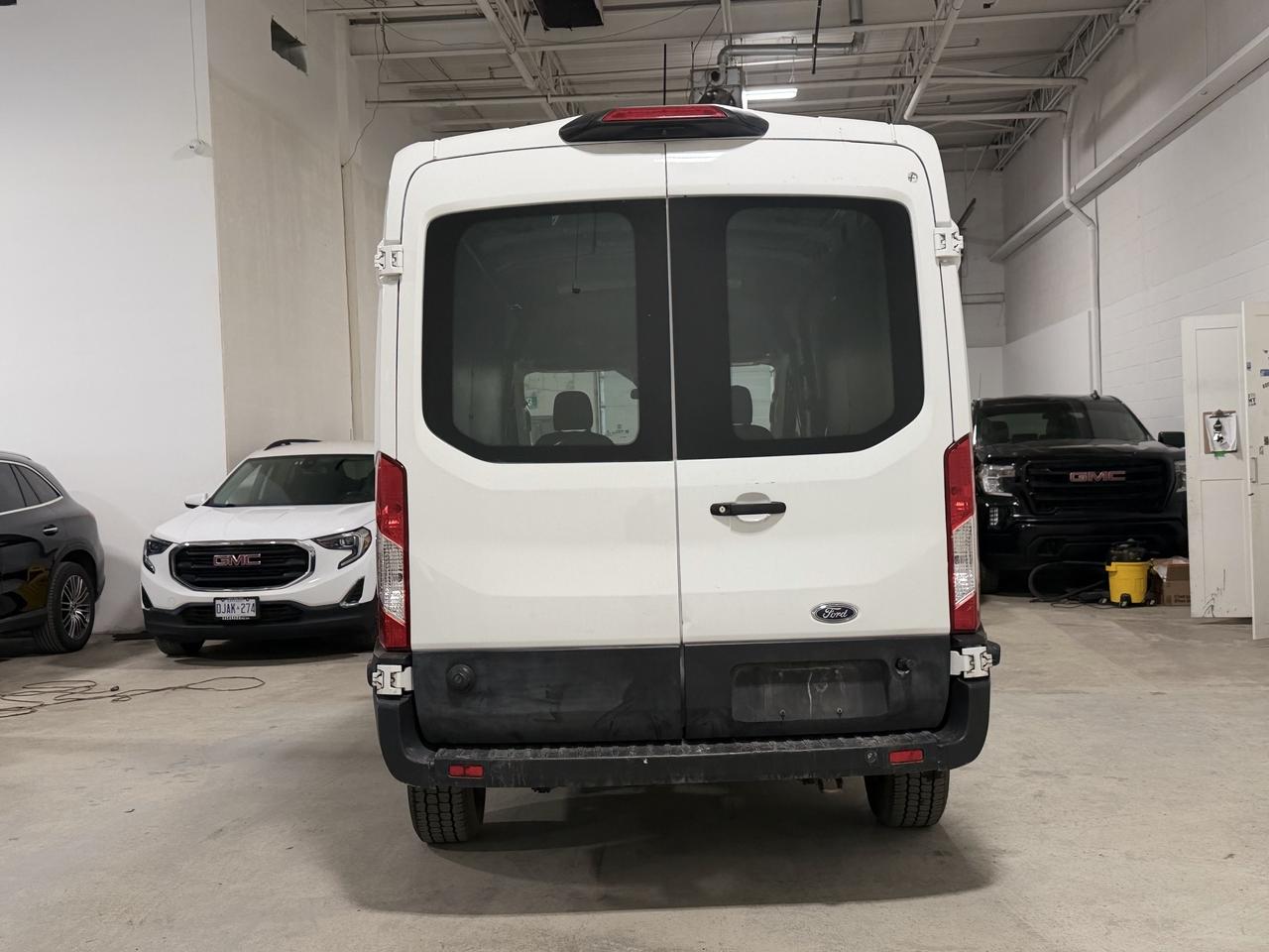 2020 Ford Transit Cargo Van 250 Van Med. Roof w/Sliding Pass. 130-in. WB Photo