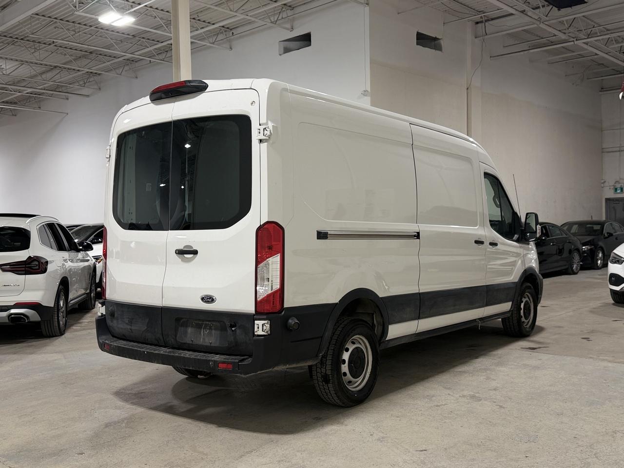 2020 Ford Transit Cargo Van 250 Van Med. Roof w/Sliding Pass. 130-in. WB Photo