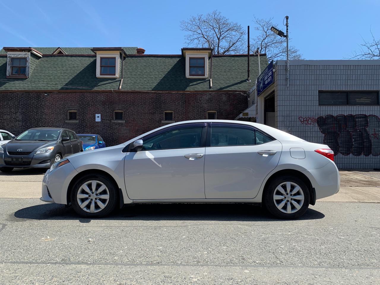 2014 Toyota Corolla 4dr Sdn CVT LE Photo