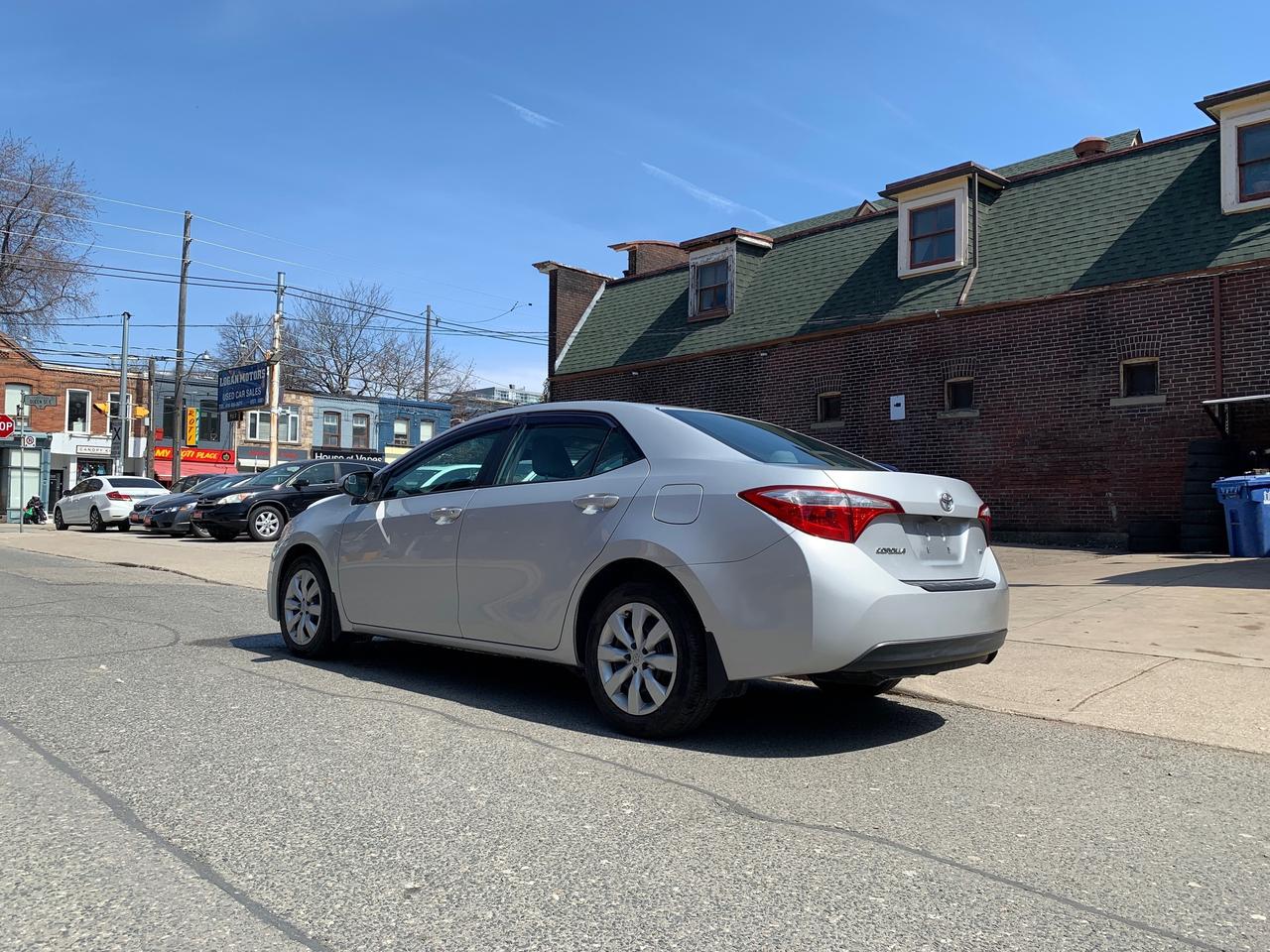 2014 Toyota Corolla 4dr Sdn CVT LE Photo