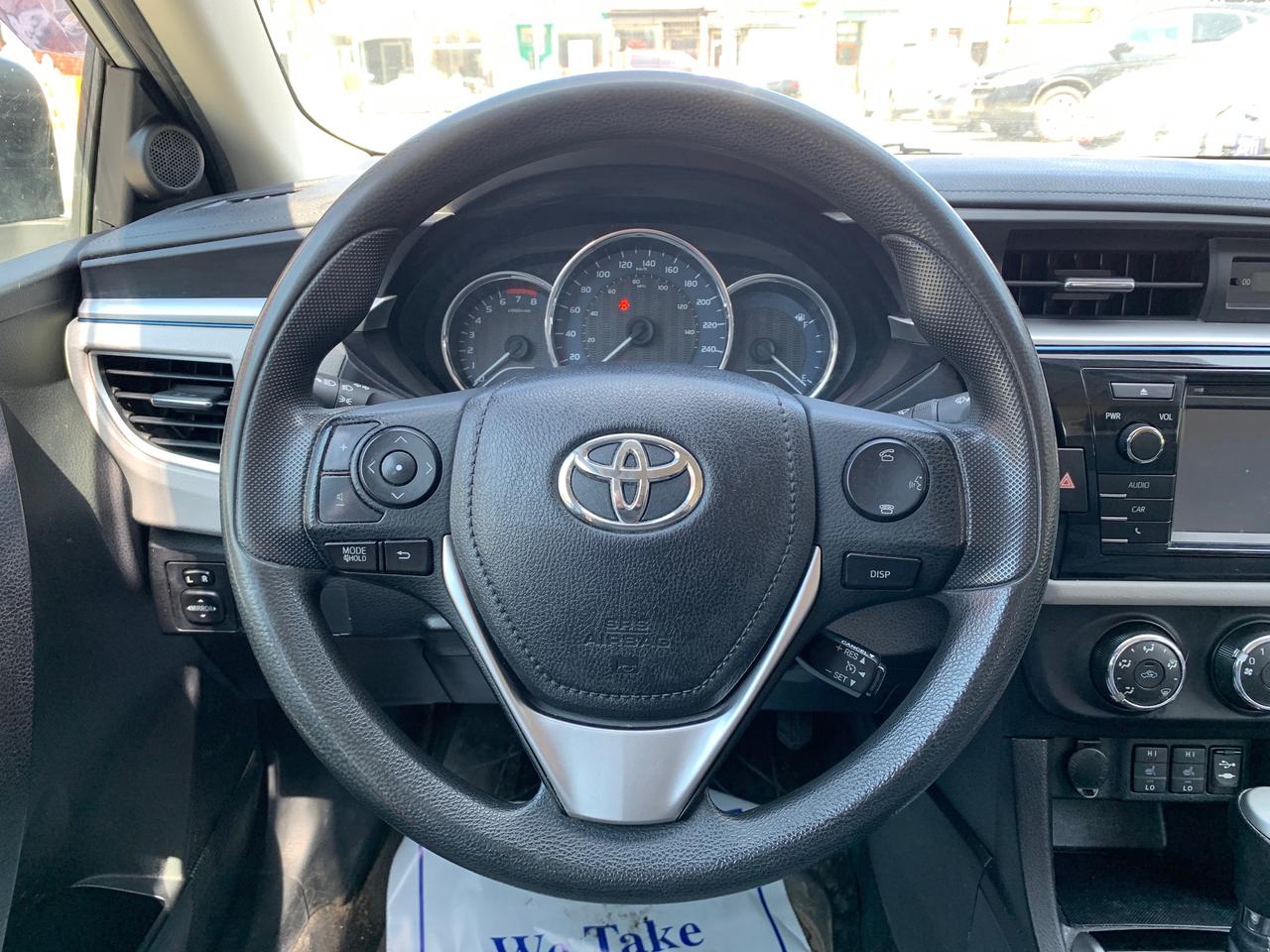 2014 Toyota Corolla 4dr Sdn CVT LE Photo