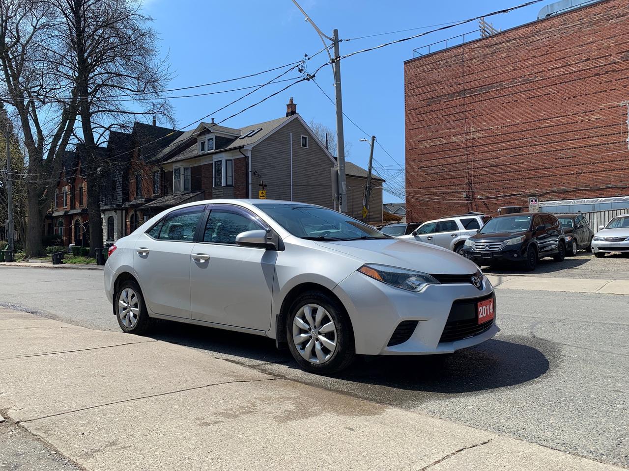 2014 Toyota Corolla 4dr Sdn CVT LE Photo