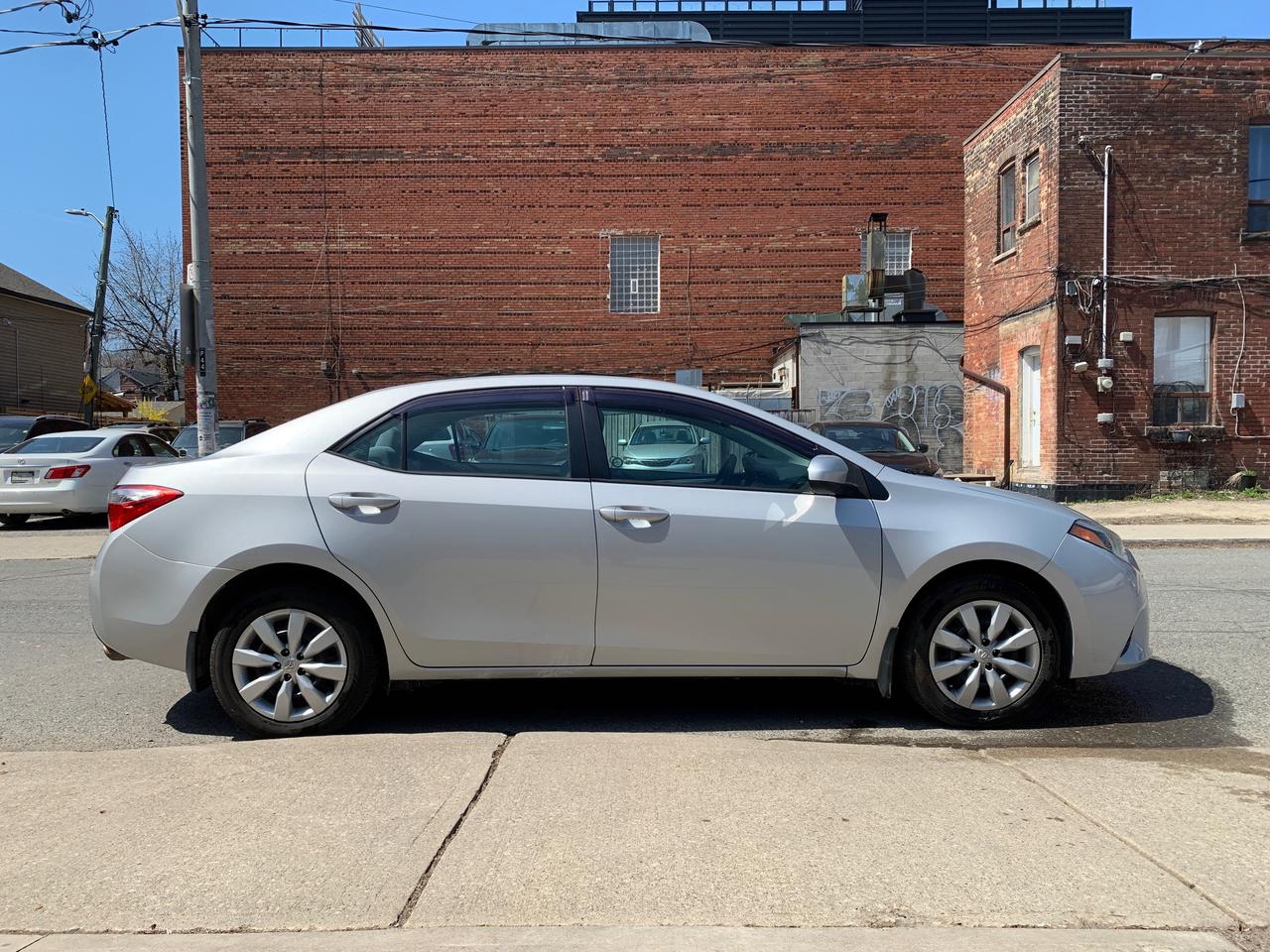 2014 Toyota Corolla 4dr Sdn CVT LE Photo
