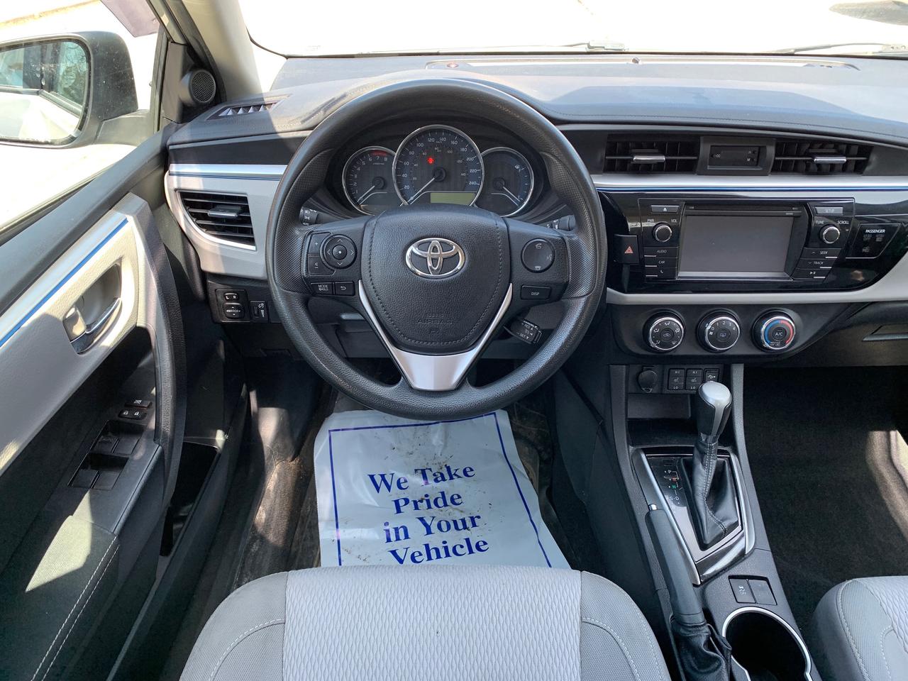 2014 Toyota Corolla 4dr Sdn CVT LE Photo