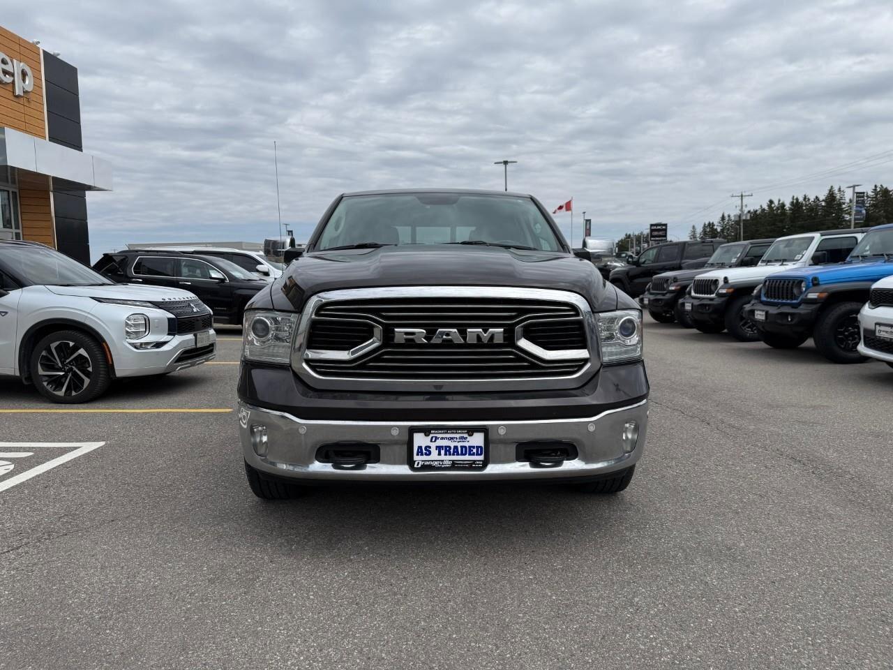 2017 RAM 1500 4WD Crew Cab 140.5  Longhorn Photo
