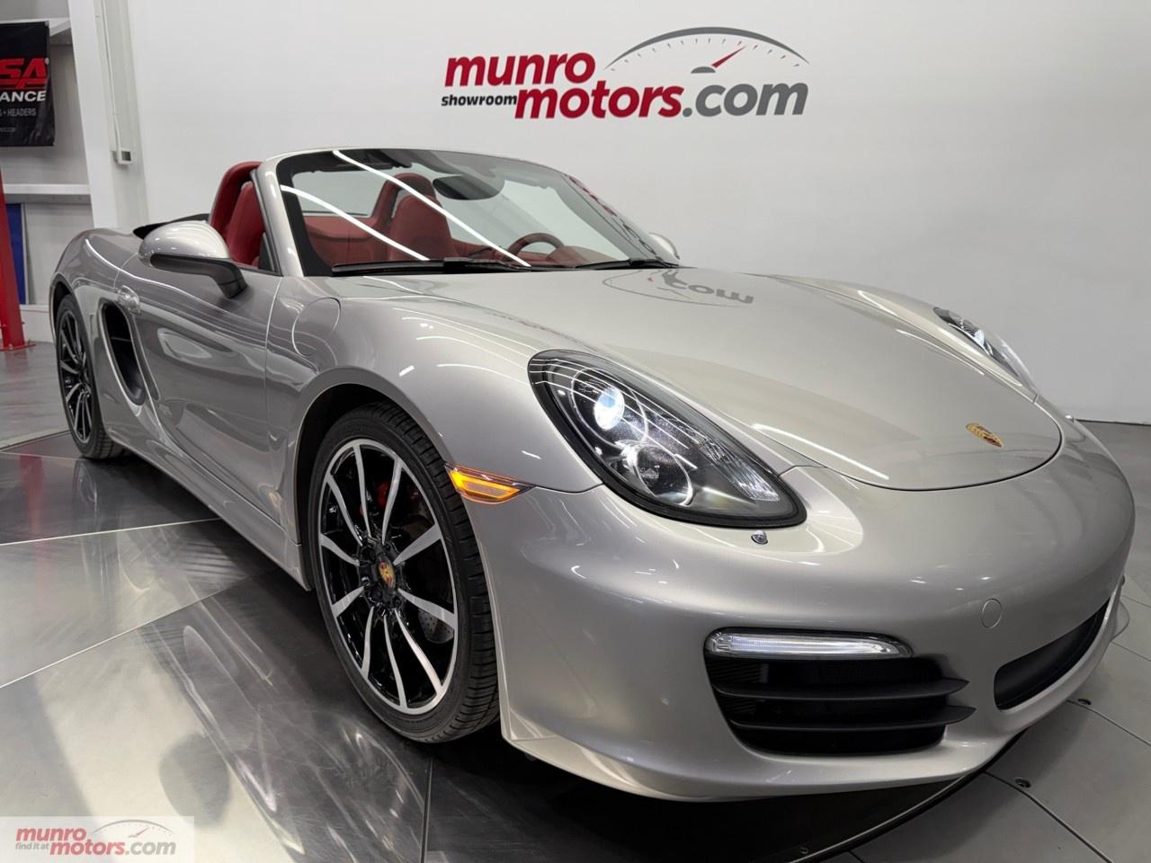 Vehicle Highlights include: PDK, 20 Inch Machined Wheels, Red Brake Calipers, Black Power Convertible Soft Top, Sport Mode, Power Adjustable Rear Spoiler, Wind Deflector, Carrera Red Leather Door Panels/Dash, Porsche Crest in Headrests, Heated Seats, Dual Zone Climate, BOSE Sound System, Universal Garage Door Opener, Navigation, Leather Trim Shifter Knob, & Chrome Script Emblems. <br /><br /> The 2013 Porsche Boxster S 2013 equipped with Porsches PDK transmission elevates an already exceptional roadster into a more precise and performance-focused machine. As part of the 981 generation, this Boxster S blends mid-engine balance, naturally aspirated power, and cutting-edge transmission technology to deliver a driving experience that feels both refined and intensely engaging. <br /><br /> At its core is a 3.4L flat-six engine producing 315 horsepower, known for its smooth, linear power delivery and unmistakable sound. Paired with the 7-speed Porsche Doppelkupplung (PDK) dual-clutch transmission, the car takes on a sharper, more responsive character. Gear changes happen almost instantly, allowing the engine to stay in its optimal power band while delivering uninterrupted acceleration. Whether left in automatic mode for smooth cruising or controlled manually via paddles, the PDK enhances both performance and usability, making the car quicker and more versatile in all driving situations. <br /><br /> The Platinum Silver Metallic exterior offers a refined, modern look with a subtle brilliance that enhances the cars sculpted design. In direct sunlight, the metallic finish reveals a bright, crisp silver tone that accentuates the Boxsters flowing lines, sharp creases, and low, athletic stance. As lighting softens, the color takes on a deeper, more subdued grey-silver appearance, adding depth and a more mature, understated character. This versatility allows the car to feel both sporty and elegant, never overly flashy yet always visually engaging. <br /><br /> Inside, the Carrera Red Natural Leather interior creates a striking and luxurious contrast. The rich red tones bring warmth and energy into the cabin, immediately drawing attention and elevating the sense of occasion every time you step inside. Unlike brighter or more synthetic reds, the natural leather finish adds depth and softness, giving the interior a more premium, almost handcrafted feel. <br /><br /> With the top down, the contrast between the cool, metallic exterior and the warm, vibrant interior becomes even more pronounced. The red cabin stands out against the silver bodywork, creating a visually dynamic and upscale presentation that feels both sporty and refined. <br /><br /> The mid-engine layout remains the defining feature of the Boxster S. With the engine positioned just behind the driver, the car achieves near-perfect balance, resulting in exceptional handling and agility. Steering is precise and communicative, and the chassis feels composed through corners, giving the driver confidence to push harder. The addition of PDK complements this balance by removing any delay between gears, allowing for seamless power delivery when exiting corners or accelerating on open roads. <br /><br /> Visually, the 2013 model introduced a more aggressive and refined design, with sharper lines and a wider stance that emphasize its performance capabilities. The power-operated soft top opens quickly, transforming the car into an open-air roadster that fully exposes the sound and character of the flat-six engine. <br /><br /> Inside, the cabin reflects Porsches commitment to quality and driver focus. Inspired by the Porsche 911 991 generation, the interior features a rising center console, premium materials, and a layout that places controls within easy reach. The environment feels both sporty and upscale, making it suitable for daily driving as well as spirited outings. <br /><br /> On the road, the PDK-equipped Boxster S feels incredibly polished. It offers the flexibility to be calm and composed in traffic while instantly transforming into a sharp, performance-driven machine when pushed. The transmissions speed and intelligence enhance every aspect of the drive, from acceleration to cornering rhythm. <br /><br /> Ultimately, the 2013 Porsche Boxster S delivers a perfect blend of precision, balance, and modern performance. It retains the purity of a mid-engine sports car while adding a level of efficiency and responsiveness that makes every drive feel effortless and exhilarating. <br /><br /> This Porsche has a Clean Carfax. Come on down to Munro Motors & see this one for yourself, it is in stock. We will look forward to seeing you real soon! <br /><br /> <p>Carfax: <a target=_blank rel=noopener noreferrer nofollow href=https://vhr.carfax.ca/en/?id=fIytrg6lIjCnG%2BU2kICPaTPMp%2Fbl2%2Fur>https://vhr.carfax.ca/en/?id=fIytrg6lIjCnG%2BU2kICPaTPMp%2Fbl2%2Fur</a></p><p></p><p>Check us out on youtube: click here</p><p>Like us on Facebook: <a target=_blank rel=noopener noreferrer nofollow href=https://www.facebook.com/munromotors/>https://www.facebook.com/munromotors/</a></p><p>We are located in Brantford, Ontario; Telephone City and the hometown of hockey legend Wayne Gretzky. Formerly located in St. George, Ontario for ten years, we are still east of London, south of Cambridge, and west of Hamilton. In order to get our customers to come here, we have to have great prices and then when you get here, we have to have a great car in order to earn your business.</p><p>Our business hours are Monday to Friday 10am to 5pm. We are closed on Saturdays and Sundays.</p><p>At Munro Motors, we find unique vehicles and post our entire stock online in order to ensure that our vehicles find their happy home.</p><p>To ensure our customers can get what they've always wanted, we offer financing services through TD Auto Finance, Desjardins, CIBC Auto Finance and Independent Leasing Companies on vehicles that are less than ten model years old and boats that are less than twenty-five model years old.</p><p>We also offer warranty products through Lubrico and GVC warranties to ensure that your mechanical baby stays in tip-top condition.</p><p>All of our vehicles are hand-picked by the very knowledgeable owner, Andy Munro, who has been connecting people to their dreams for many years.</p><p><a target=_blank rel=noopener noreferrer nofollow href=http://Munromotors.com>Munromotors.com</a></p><p>Email: <a target=_blank rel=noopener noreferrer nofollow><u>sales@munromotors.com</u></a></p><p>Most of our vehicles are already reconditioned, saftied, etested and ready to drive home with you.</p><p>Delivery is available. Ask for details</p><p>All prices are subject to HST and licensing, no hidden fees.</p>
