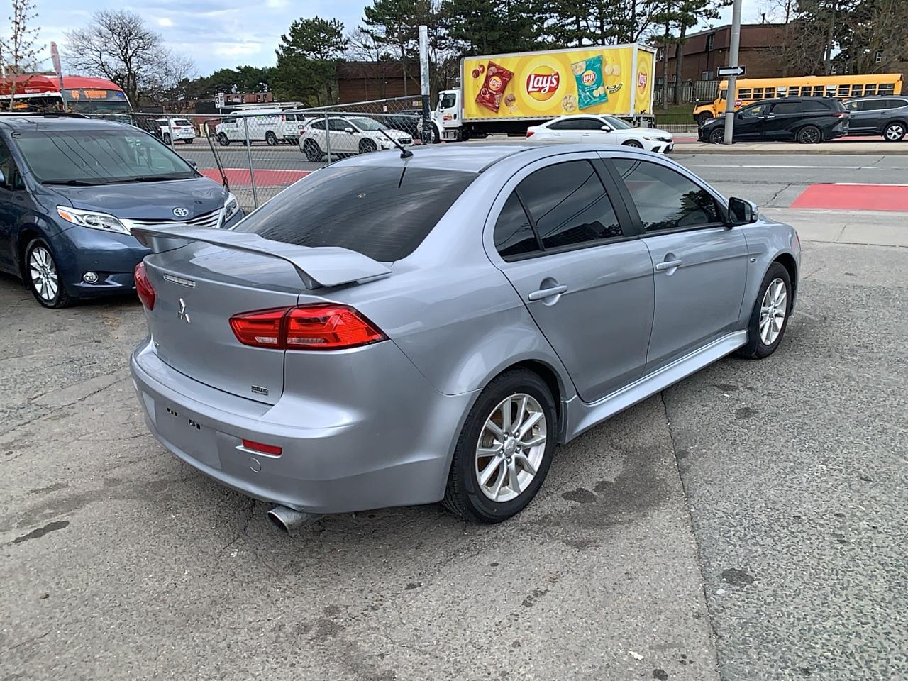 2015 Mitsubishi Lancer LIMITED /AWD / ALLOYS / RUNS GOOD / NO ACCIDENT/AC Photo4