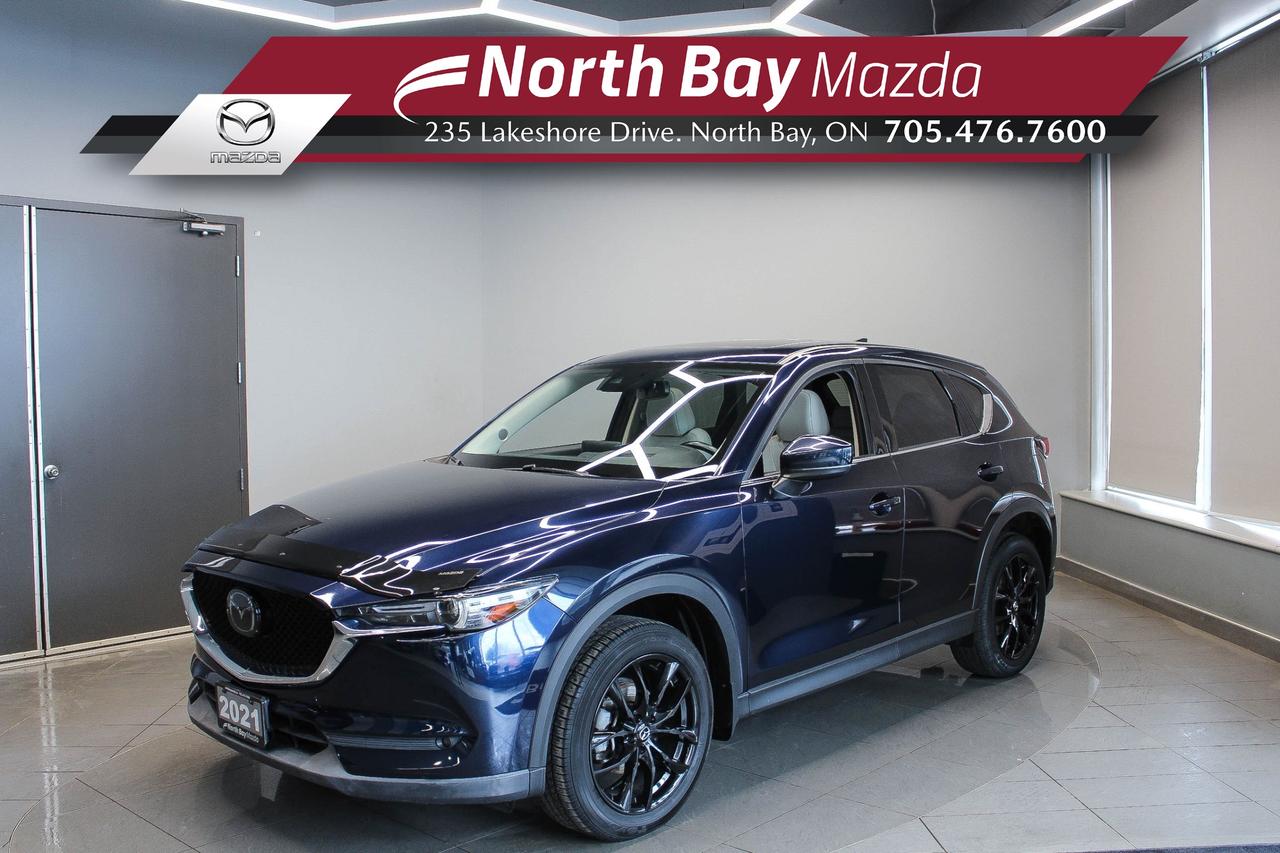 The 2021.5 Mazda CX-5 GT delivers a refined driving experience with the right balance of performance, comfort, and everyday practicality. The drive feels composed and solid, making it just as comfortable on longer trips as it is around town. Inside, the GT trim adds a noticeable step up in finish and technology, with a clean layout and premium touches that make every drive more enjoyable. FEATURES: 2.5L SKYACTIV-G engine, i-Activ AWD, 6-speed automatic transmission, leather-trimmed seats, heated and ventilated front seats, heated rear seats, heated steering wheel, power drivers seat with memory, power passenger seat, 10.25-inch centre display, Mazda Connect infotainment system, Apple CarPlay and Android Auto, Bose premium audio system, dual-zone automatic climate control, power moonroof, power liftgate, keyless entry with push-button start, adaptive cruise control, blind spot monitoring, rearview camera, heads up display.

Why Youll Want to Buy from North Bay Mazda? *The Clubhouse Commitment Pre-Owned Vehicle Program provides you with additional coverage for things such as the 3-year Tire and Rim Coverage, The Clubhouse Powertrain Warranty, coverage for The Little Things like battery, wiper, and bulb replacement, 3- year anti-theft protection to give you the ultimate peace of mind when purchasing a pre-owned vehicle. Clubhouse Commitment is an optional coverage which 
can be purchased at time of sale for a $699 value. Pre-Owned Vehicle purchases are subject to 
an adjusted price when purchasing with cash. You are eligible for Finance Pricing with a maximum down payment of 15% of listed finance price. Contact us for more details. * Our certified vehicles go through a 120-point Clubhouse Certified Used Vehicle Inspection, and we will provide the CarFax vehicle history documents as well as any available service history. * We competitively price our vehicles below the market average which means that we have already done all the market research for you. Rest assured that you are getting the best deal possible. * We have automotive financial experts who are experienced in dealing with all levels of credit challenges. We also work with all major banks and third-party lenders daily so we are confident that we can get you the best rate available. * As a premier New and Pre-Owned vehicle 
dealership, we pride ourselves on a superior customer experience and a lifetime of customer care. We are conveniently located at 235 Lakeshore Drive, in North Bay, Ontario. If you cant make it to us, we can accommodate you! Call us today at 705-476-7600 to come in and see this vehicle!