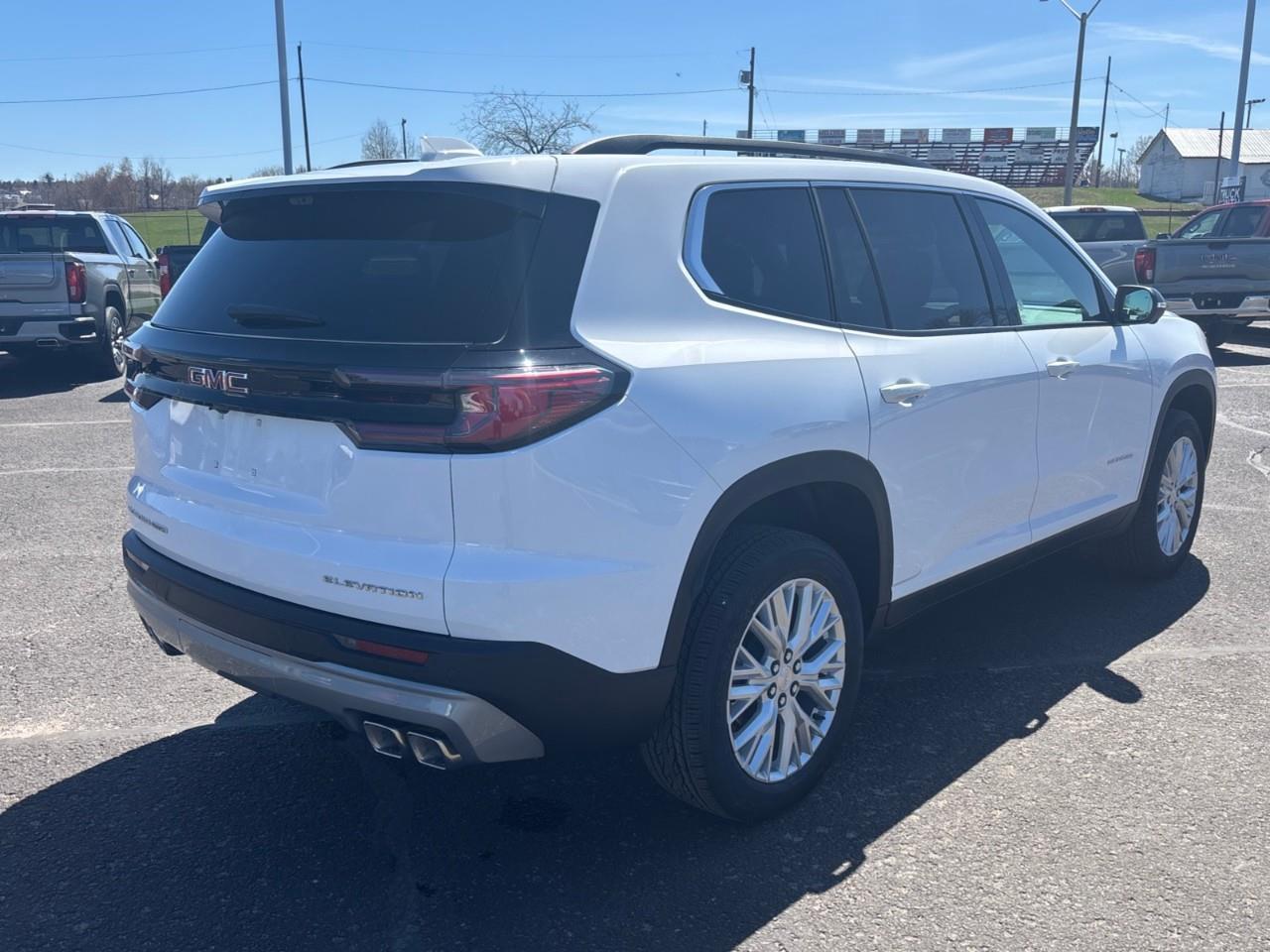 2026 GMC Acadia Elevation New 7 Passenger AWD SUV with Panoramic Sunroof, Heated First and Second Row Seats, Heated Steering Wheel, Heated Front Wiper Park, Drivers Head-Up Display, Adaptive Cruise Control, and a 15 Diagonal P Photo