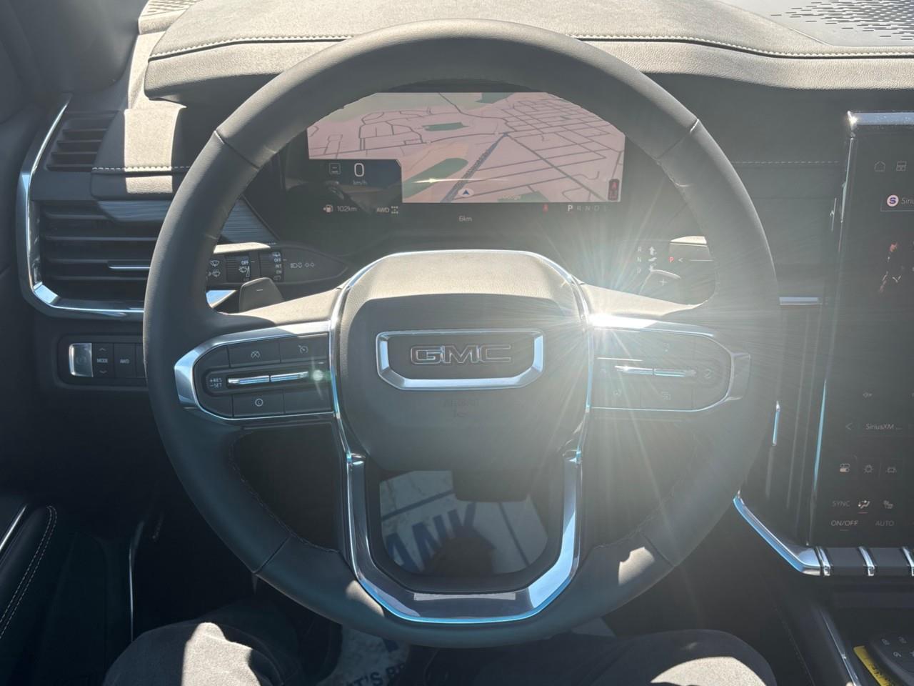 2026 GMC Acadia Elevation New 7 Passenger AWD SUV with Panoramic Sunroof, Heated First and Second Row Seats, Heated Steering Wheel, Heated Front Wiper Park, Drivers Head-Up Display, Adaptive Cruise Control, and a 15 Diagonal P Photo