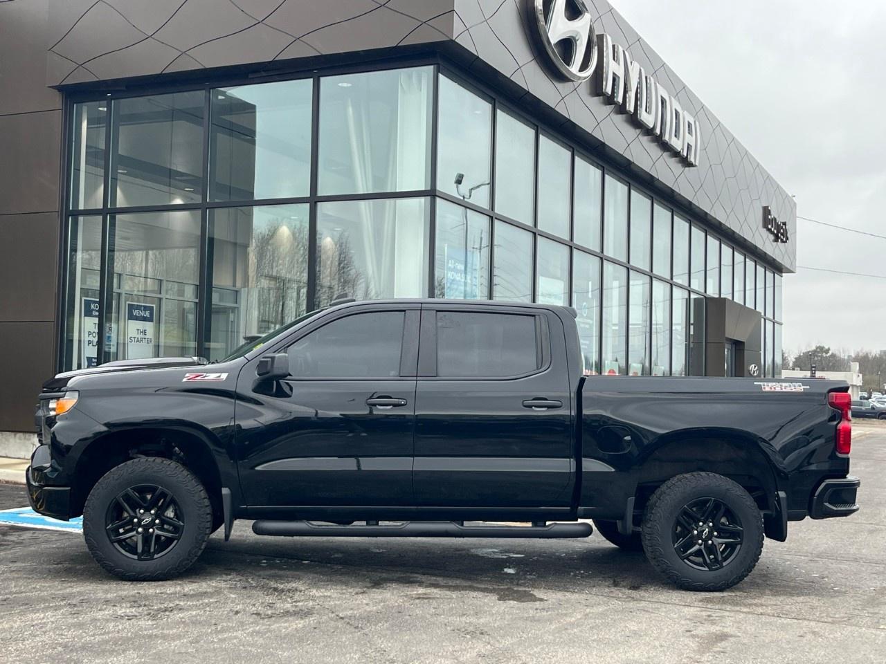 2024 Chevrolet Silverado 1500 Crew Cab Short Box 4-Wheel Drive Custom Trail Boss Photo