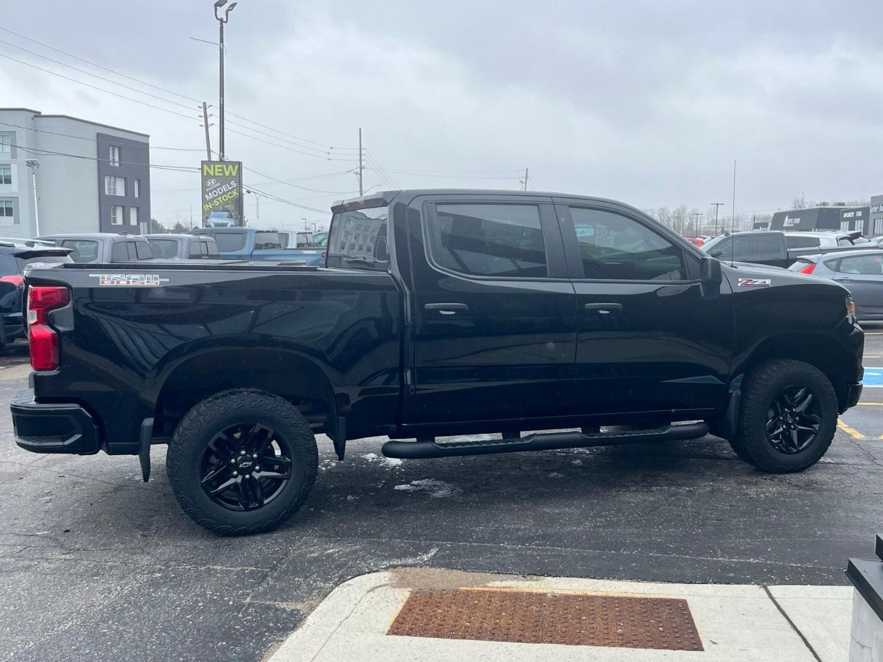 2024 Chevrolet Silverado 1500 Crew Cab Short Box 4-Wheel Drive Custom Trail Boss Photo
