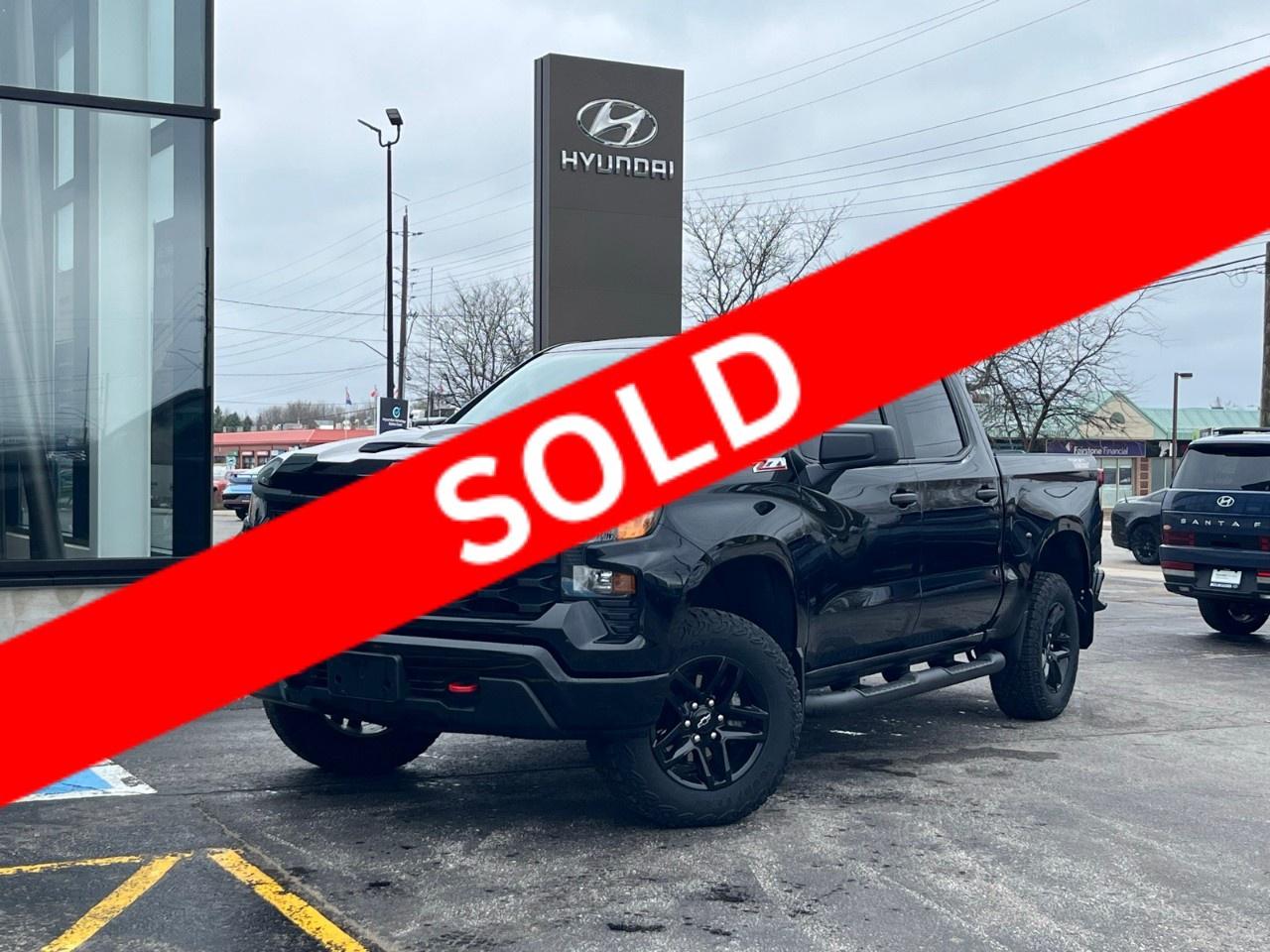 2024 Chevrolet Silverado 1500 Crew Cab Short Box 4-Wheel Drive Custom Trail Boss Photo