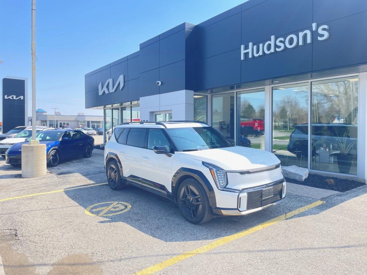 <p>This beautiful EV9 was employee driven! Features include <span style=color:rgb( 10 , 10 , 10 )>All-Wheel Drive, 379 Horsepower and 516 lb-ft of Torque, 99.8 kWh Battery, Snow White Pearl Exterior, Pecan Brown Leather Interior, Dual Sunroof, 6-Passenger Seating with 2nd-row Captain's Chairs, Premium GT-Line Embossed Seating, Heated/Vented Front Premium Relaxation Seats with Power Leg Rest, Heated/Vented Second Row Seats, Driver's Seat Memory and Bolster Adjustment, Power-folding 3rd-Row Seats, Heads-up Display, Remote Smart Parking Assist, Parking Collision Avoidance Assist (front, side, reverse), blind-view monitor, Highway Driving Pilot, Heated Steering Wheel, Dual 12.3-inch Display Infotainment Screens with Kia Connect, Navigation, Meridian premium audio system (14 speakers), Power Heated Adjustable Gloss Black Side View Mirrors, GT-Line Specific Bumper Design, Roof Rails, Self-leveling Rear Suspension, 21-inch Alloy Wheels with Aero Covers.</span></p><p><em>The Larry Hudson Group is a family run automotive organization that has enjoyed growth for over 42 years of business. We have a great selection of new inventory and what we feel are the best reconditioned used cars in Ontario. Hudsons NEED your trade. We can offer you top market value for your current vehicle. Please come and partake in a great buying experience with the Larry Hudson Group in Listowel. FREE CarFax report available with every used vehicle!</em></p>