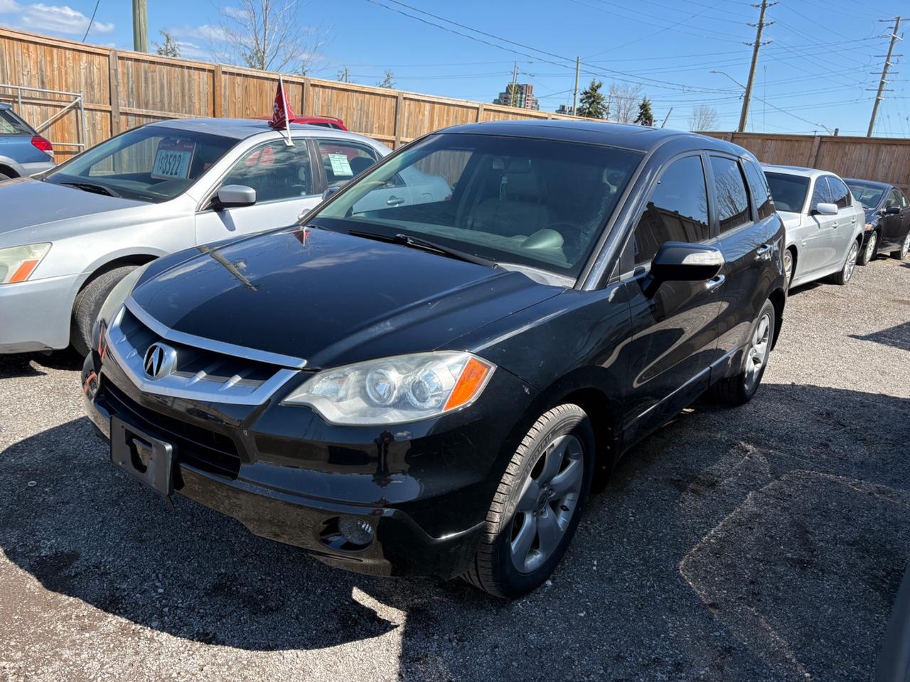 2008 Acura RDX. Black exterior, and beige leather interior. The vehicle has odometer is 201,151 km and runs and drives with no engine light on. The vehicle is sold as is and may require additional work. We do not perform mechanical checks or provide safety inspections.