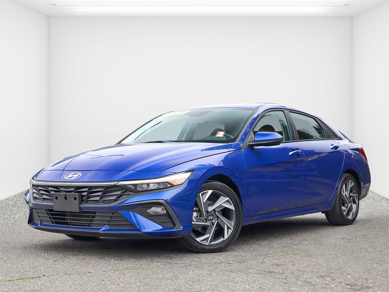 Tech Package | Sunroof | Heated Seats & Steering Wheel | Apple CarPlay & Android Auto | Blind-Spot Collision Warning | Lane Keeping Assist | Certified Pre-Owned<br /><br />2025 Hyundai Elantra Preferred w/ Tech Package FWD<br /><br />This 2025 Hyundai Elantra Preferred FWD with Tech Package in Blue is now available at White Rock Hyundai, offering standout style and efficiency in a well-equipped compact sedan. With only 27,000 km, this Hyundai Certified Pre-Owned Elantra comes with a clean history and has been kept in excellent condition. Its 2.0L engine paired with a CVT transmission provides smooth performance and excellent fuel economy for commuting around White Rock, Surrey, and the Lower Mainland.<br /><br />Inside, the Tech Package enhances the driving experience with a sunroof, larger digital displays, and full smartphone integration through Apple CarPlay and Android Auto. Heated seats and a heated steering wheel add comfort, while advanced safety features including blind-spot collision warning and lane keeping assist provide added peace of mind. If you're searching for a used Hyundai Elantra for sale in White Rock, this low km Certified Pre-Owned option stands out with style and value.<br /><br />Why Buy From White Rock Hyundai?<br />* 7x Hyundai President's Award of Merit Winner<br />* 3x Consumer Choice Award for Business Excellence<br />* AutoTrader Dealer of the Year<br /><br />M-Promise Certified Pre-Owned ($995 value) includes:<br />* 30-day / 2,000 km Exchange Program<br />* 3-day / 300 km Money Back Guarantee<br />* Comprehensive 144-Point Mechanical Inspection<br />* Full Synthetic Oil Change<br />* BC Verified CARFAX<br />* Minimum 6 Month Powertrain Warranty<br /><br />Hyundai Certified Pre-Owned Benefits<br />* 144-Point Inspection<br />* CARFAX Vehicle History Report<br />* Transferable 6-Year / 120,000 km Powertrain Limited Warranty (This is an additional 1 year/20, 000 km beyond the original factory warranty)<br />* 1 Year 24-Hour Roadside Assistance<br />* Preferred Financing Rates Available OAC<br />* 30-Day / 2,000 km Exchange Privilege<br /><br />Buy with confidence at White Rock Hyundai. Our vehicles are priced competitively based on market demand, condition, and kilometres to give our customers a transparent and hassle-free buying experience.<br /><br />Visit White Rock Hyundai today to test drive this 2025 Hyundai Elantra Preferred w/ Tech Package FWD. We proudly serve drivers in White Rock, South Surrey, Surrey, Delta, Langley, and Vancouver with quality pre-owned vehicles and a professional, no-pressure experience.<br /><br />Contact our team today to confirm availability, explore financing options, and reserve this vehicle.<br /><br />* All vehicle purchases are subject to a $799 administration fee. Dealer #31129.