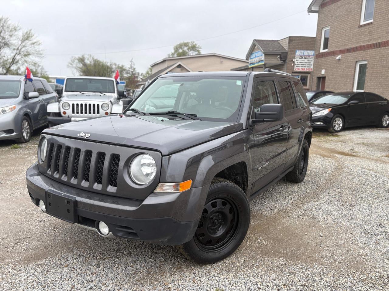 <p><strong>2016 Jeep Patriot  Fully Loaded | 4x4 | Safety Included | 1-Year Powertrain Warranty</strong></p><p>Well-maintained <strong>2016 Jeep Patriot 4x4</strong>, offering a practical SUV design with good capability for year-round driving. Fully loaded with comfort and convenience features, making it a solid choice for daily use or light-duty utility needs.</p><p>The vehicle comes <strong>Ontario safety certified and ready for the road</strong>, with a <strong>1-Year Powertrain Warranty included</strong>.</p><p> 4x4 capability<br> Fully loaded<br> Safety certified<br> 1-Year Powertrain Warranty included</p><p><strong>Features</strong></p><p>Leather seats<br>Touchscreen display<br>Bluetooth connectivity<br>Heated seats<br>Alloy wheels<br>Towing hitch<br>Power options (windows, locks, mirrors)<br>Spacious interior with flexible cargo space</p><p><strong>Condition and driving</strong></p><p>Drives smooth and comfortable<br>Well maintained<br>Fully inspected and safety ready</p><p>This Patriot offers a good balance of practicality, capability, and comfort, making it suitable for commuting, winter driving, or light towing needs.</p><p><strong>Warranty</strong></p><p>1-Year Powertrain Warranty Included</p><p>Coverage includes major components such as:</p><p> Engine<br> Transmission<br> Differential</p><hr><p><strong>AUTO NATION CAR SALES & SERVICES</strong><br>9300 Tecumseh Rd. East, Windsor, ON N8R 1A2<br>Call or Text: 226-246-2429</p><p>We accept Debit / Visa / Mastercard / AMEX.<br>All-in pricing (plus HST & licensing only).</p><span id=jodit-selection_marker_1777142317313_1291359232018524 data-jodit-selection_marker=start style=line-height: 0; display: none;></span>