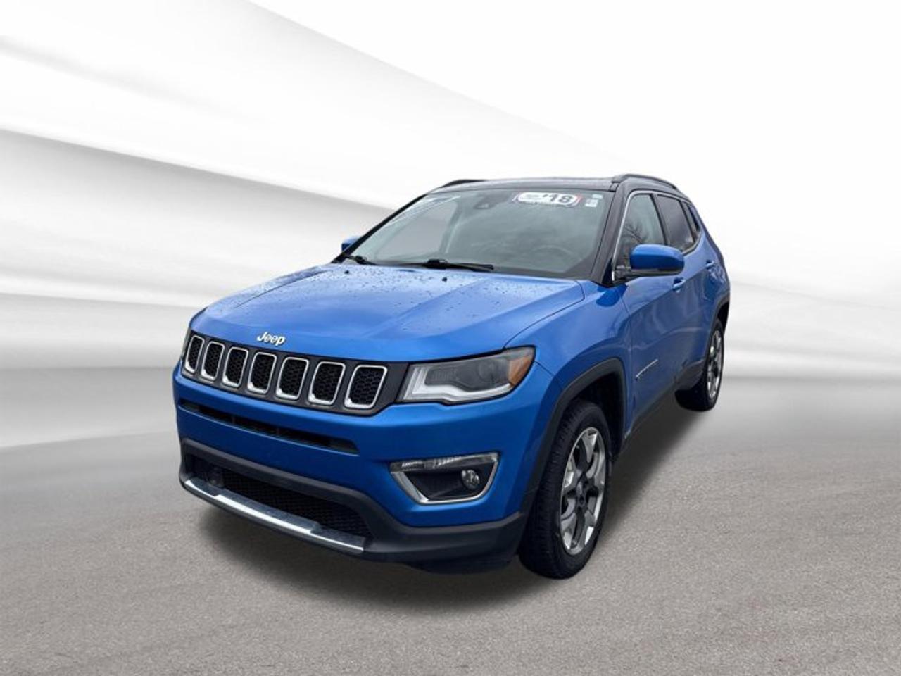 Meet the 2018 Jeep Compass Limited, a compact SUV that fits city life and weekend travel with ease. Finished in blue with a black interior, this used Compass offers four-wheel drive, a smooth automatic transmission, and Jeep confidence for Halifax roads in every season.With 161,417 km, this 2018 Jeep Compass Limited shows the value of a well-equipped SUV built for daily comfort and practical use. Its 2.4-litre regular unleaded four-cylinder engine delivers balanced power, while the power liftgate, HD Radio, and Forward Collision Warning add key convenience and peace of mind.FEATURES OF THE Compass LimitedBlue exterior with black interiorFour-door SUV with automatic transmissionFour-wheel drive for added tractionPower liftgate for easier loadingADVANCED SAFETY FEATURESForward Collision Warning helps reduce risksFour-wheel drive adds road confidenceFour doors allow easy passenger accessSolid SUV design supports daily securityPERFORMANCE AND EFFICIENCY2.4-litre four-cylinder gas engineAutomatic transmission for smooth shiftingFour-wheel drive for changing conditionsBalanced power for city and highwayCOMFORT AND CONVENIENCEPower liftgate simplifies cargo accessSpacious cabin for daily driving comfortFour-door layout helps passenger entryBlack interior offers a clean lookTECHNONOLGY AND CONNECTIVITYHD Radio delivers clear audio qualityEasy infotainment access for daily useClear driver information at a glanceUseful technology for modern travelCARGO SPACERear cargo area suits daily errandsPower liftgate helps with loadingSUV shape supports versatile storageRoom for groceries and gearAWARDS & RECOGNITIONSTop Safety Pick, Insurance Institute for Highway Safety, 2018WHAT OTHER OWNERS LIKEConfident four-wheel drive in poor weatherPractical size for city parkingUseful cargo room for everyday needsSmooth ride for daily commutingThe 2018 Jeep Compass Limited is a smart choice for drivers who want useful space, year-round traction, and a refined feel in a compact SUV. Its size makes it easy to park in Halifax, while the cabin and cargo area provide the flexibility many drivers need for work, errands, and family use.This 2018 Jeep Compass Limited also stands out with simple, valuable features that matter every day. The power liftgate helps when your hands are full, HD Radio improves the listening experience, and Forward Collision Warning adds extra awareness on busy roads. Combined with Jeep utility and a capable four-wheel-drive system, this Compass is ready for the road ahead.This 2018 Jeep Compass Limiteds VIN is: 3C4NJDCB9JT422246.We invite you to book a viewing and test drive at your earliest convenience
