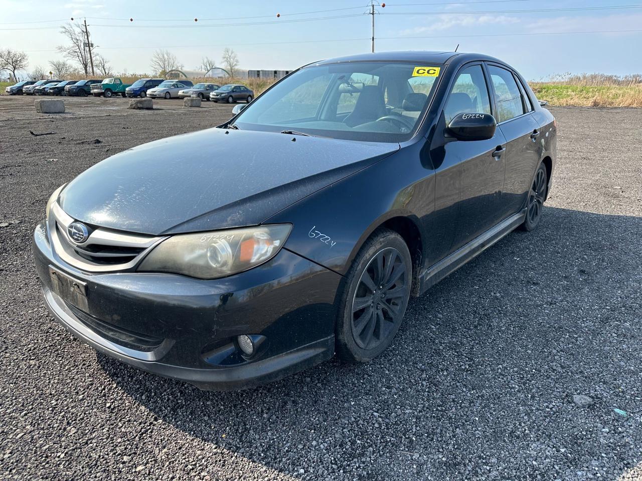 Sold As-Is. CarFax Provided. Sporty low mileage Impreza in sharp black on black. Dont miss your chance to see this clean vehicle in excellent condition! Book your appointment now