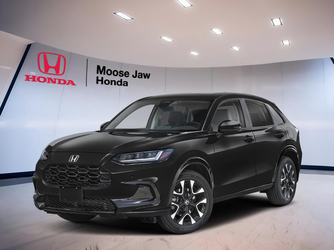 Meet the brand new 2026 Honda HR-V Ex-L at Moose Jaw Honda in Moose Jaw. This compact SUV blends smart size, confident all-wheel drive, and everyday ease. Finished in Black with a Black interior, it delivers a clean, upscale look and the trusted practicality Canadian drivers want all year.

Powered by a 2.0-litre inline 4-cylinder 16-valve DOHC engine with VTEC and paired with a Continuously Variable Transmission, the 2026 Honda HR-V Ex-L is built for smooth response and simple efficiency. Its all-wheel drive system adds extra confidence for changing road and weather conditions around Saskatchewan.

FEATURES OF THE HR-V Ex-L

»» Black exterior with refined SUV presence
»» Black interior with upscale cabin feel
»» All-wheel drive for year-round confidence
»» CVT for smooth daily driving

ADVANCED SAFETY FEATURES

»» Honda Sensing suite supports safer travel
»» Collision mitigation braking helps reduce impacts
»» Lane keeping assist supports steady driving
»» Road departure mitigation adds extra confidence

PERFORMANCE AND EFFICIENCY

»» 2.0-litre VTEC four-cylinder engine power
»» Continuously Variable Transmission delivers smooth acceleration
»» All-wheel drive enhances traction year-round
»» Efficient design suits commuting and errands

COMFORT AND CONVENIENCE

»» Dual-zone climate control adds cabin comfort
»» Spacious layout supports daily passenger ease
»» Easy entry height suits urban driving
»» Quiet ride helps reduce road fatigue

TECHNONOLGY AND CONNECTIVITY

»» Clear infotainment layout keeps controls simple
»» Driver information display supports quick checks
»» Useful connectivity features aid daily routines
»» Modern cabin design feels intuitive throughout

CARGO SPACE

»» Flexible rear cargo area for gear
»» Split rear seating expands carrying options
»» Wide opening helps load larger items
»» Compact size stays easy to park

WHAT OTHER OWNERS LIKE

»» Comfortable ride for daily city driving
»» Useful cargo flexibility for active lifestyles
»» Confident all-wheel drive in winter
»» Easy controls and smooth power delivery

The 2026 Honda HR-V Ex-L is a smart fit for drivers who want value, comfort, and everyday versatility in one well-sized SUV. It feels easy to drive in town, simple to park, and ready for weekend plans, shopping trips, commuting, and changing prairie weather.

Its black-on-black colour combination gives this 2026 Honda HR-V Ex-L a polished and modern appearance. The overall design is clean and confident, while the cabin focuses on practical comfort and user-friendly function. This is an SUV made to fit real life without feeling oversized.

For drivers shopping for a new crossover at Moose Jaw Honda, the 2026 Honda HR-V Ex-L stands out with dependable Honda engineering, practical space, and all-wheel-drive assurance. It is a well-rounded choice for singles, couples, and small families who want everyday usefulness with a more premium feel.

This 2026 Honda HR-V Ex-Ls VIN is: 3CZRZ2H79TM111474.<p>Meet the brand new 2026 Honda HR-V Ex-L at Moose Jaw Honda in Moose Jaw. This compact SUV blends smart size</p>
<p> upscale look and the trusted practicality Canadian drivers want all year.

Powered by a 2.0-litre inline 4-cylinder 16-valve DOHC engine with VTEC and paired with a Continuously Variable Transmission</p>
<p> the 2026 Honda HR-V Ex-L is built for smooth response and simple efficiency. Its all-wheel drive system adds extra confidence for changing road and weather conditions around Saskatchewan.

FEATURES OF THE HR-V Ex-L

»» Black exterior with refined SUV presence
»» Black interior with upscale cabin feel
»» All-wheel drive for year-round confidence
»» CVT for smooth daily driving

ADVANCED SAFETY FEATURES

»» Honda Sensing suite supports safer travel
»» Collision mitigation braking helps reduce impacts
»» Lane keeping assist supports steady driving
»» Road departure mitigation adds extra confidence

PERFORMANCE AND EFFICIENCY

»» 2.0-litre VTEC four-cylinder engine power
»» Continuously Variable Transmission delivers smooth acceleration
»» All-wheel drive enhances traction year-round
»» Efficient design suits commuting and errands

COMFORT AND CONVENIENCE

»» Dual-zone climate control adds cabin comfort
»» Spacious layout supports daily passenger ease
»» Easy entry height suits urban driving
»» Quiet ride helps reduce road fatigue

TECHNONOLGY AND CONNECTIVITY

»» Clear infotainment layout keeps controls simple
»» Driver information display supports quick checks
»» Useful connectivity features aid daily routines
»» Modern cabin design feels intuitive throughout

CARGO SPACE

»» Flexible rear cargo area for gear
»» Split rear seating expands carrying options
»» Wide opening helps load larger items
»» Compact size stays easy to park

WHAT OTHER OWNERS LIKE

»» Comfortable ride for daily city driving
»» Useful cargo flexibility for active lifestyles
»» Confident all-wheel drive in winter
»» Easy controls and smooth power delivery

The 2026 Honda HR-V Ex-L is a smart fit for drivers who want value</p>
<p> and changing prairie weather.

Its black-on-black colour combination gives this 2026 Honda HR-V Ex-L a polished and modern appearance. The overall design is clean and confident</p>
<p> while the cabin focuses on practical comfort and user-friendly function. This is an SUV made to fit real life without feeling oversized.

For drivers shopping for a new crossover at Moose Jaw Honda</p>
<p> and small families who want everyday usefulness with a more premium feel.

This 2026 Honda HR-V Ex-Ls VIN is: 3CZRZ2H79TM111474.</p>