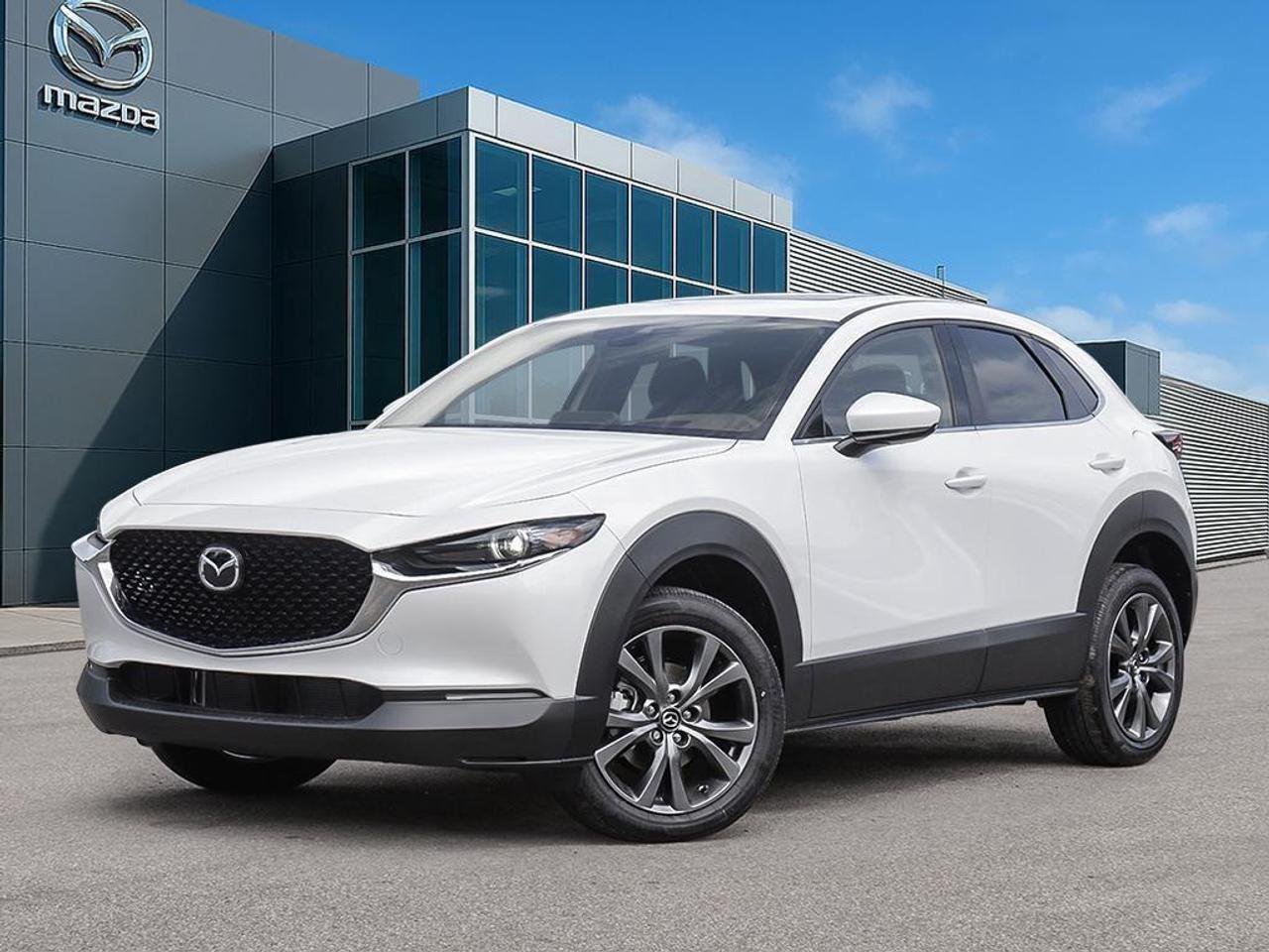 <p>Presenting the new 2026 Mazda CX-30 GT AWD in a pristine white exterior, paired elegantly with a garnet red leather interior. This SUV offers an impressive all-wheel-drive system, ensuring confident handling across various terrains.</p><p>The exterior of this Mazda CX-30 boasts stunning Snowflake White Pearl paint, complemented by sleek alloy wheels and stylish features like a sunroof/moonroof. Step inside and experience the luxurious feel of leather seats that are matched with a leather steering wheel and leatherette door trim inserts. Enjoy the convenience of power windows and seats, as well as the added comfort of heated front seats and steering wheel.</p><p>Modern technology in the CX-30 enhances every journey. The heads-up display keeps important information in your line of sight, while the integrated navigation system ensures you stay on course. With Bluetooth connectivity and smart device integration, you can easily stay connected on the go. Safety is paramount with features like a backup camera, parking sensors, lane assist, and adaptive cruise control, providing peace of mind on every drive.</p><p>This vehicle is ideal for drivers who value a blend of luxury, technology, and safety. Whether you're navigating city streets or taking a weekend adventure, the 2026 Mazda CX-30 GT AWD is designed to impress. Contact Cobourg Mazda for more information and to take advantage of fantastic offers like a 2.99% Lease APR, 1% Owner Loyalty, and $500 Event Funds. Get in touch today to explore all that this exceptional SUV has to offer.</p>