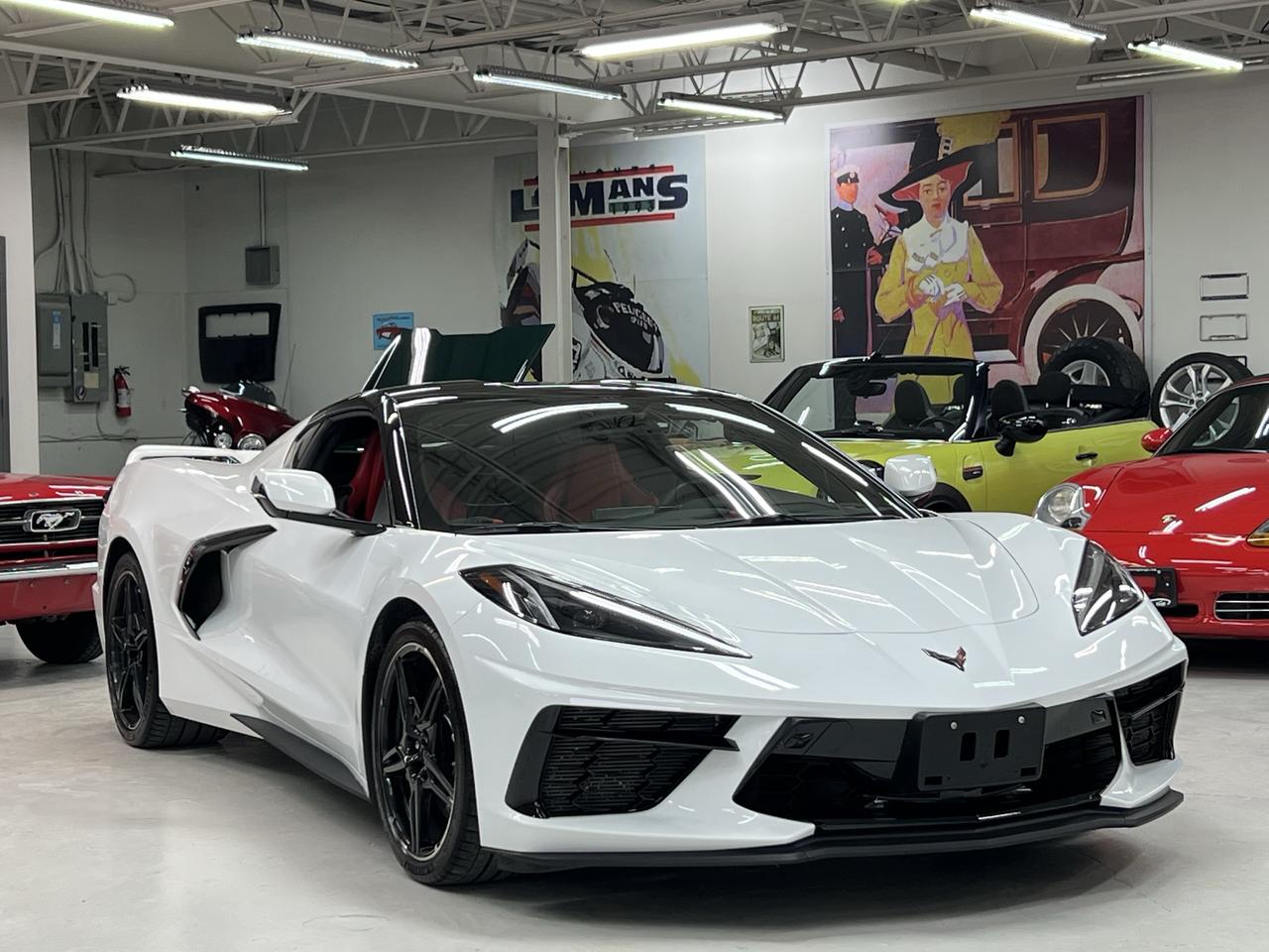 <h2 data-section-id=9citmx data-start=133 data-end=220><span role=text><strong data-start=136 data-end=220>2020 Chevrolet Corvette Stingray Coupe &ndash; 2LT Z51 | Arctic White / Adrenaline Red</strong></span></h2><p data-start=222 data-end=263>Some cars simply stand out from the rest. This 2020 Corvette is proudly wears the original 1953 Corvette signature colours!</p><p data-start=265 data-end=541>At Lee Munro&rsquo;s Garage, we don&rsquo;t sell cars &mdash; we buy cars that sell themselves. This 2020 Corvette Stingray is an original, unmodified, exceptional example&mdash;properly equipped with the <strong data-start=446 data-end=473>Z51 Performance Package</strong>, and selected based on condition, specification, and how it drives.</p><p data-start=543 data-end=633>This is the kind of car you buy for <strong data-start=579 data-end=605>long-term satisfaction</strong>, and instant gratification (in 2.9 seconds).</p><hr data-start=635 data-end=638><h3 data-section-id=7lsaz3 data-start=640 data-end=661><span role=text><strong data-start=644 data-end=661>The Right Car</strong></span></h3><p data-start=663 data-end=869>Finished in <strong data-start=675 data-end=711>Arctic White over Adrenaline Red</strong>, this is a classic, high-contrast Corvette combination that never goes out of style. Clean, purposeful, and exactly how a mid-engine Corvette should present.</p><p data-start=871 data-end=1033>The addition of the <strong data-start=891 data-end=914>Carbon Flash wheels</strong>, black composite rockers, and Z51 rear spoiler gives the car the right stance&mdash;subtle, but clearly performance-focused.</p><hr data-start=1035 data-end=1038><h3 data-section-id=c4bzz2 data-start=1040 data-end=1090><span role=text><strong data-start=1044 data-end=1090>Z51 Performance Package &mdash; Ordered Properly</strong></span></h3><p data-start=1092 data-end=1154>This Corvette wasn&rsquo;t just ordered well&mdash;it was ordered <em data-start=1146 data-end=1153>right</em>.</p><p data-start=1156 data-end=1254>The <strong data-start=1160 data-end=1175>Z51 package</strong> transforms the car from a standard Stingray into something much more complete:</p><ul data-start=1256 data-end=1479><li data-section-id=uci9ys data-start=1256 data-end=1288>Performance suspension (FE3)</li><li data-section-id=13jchpw data-start=1289 data-end=1329>Electronic limited-slip differential</li><li data-section-id=tgng02 data-start=1330 data-end=1356>Z51 performance brakes</li><li data-section-id=1bu9wv6 data-start=1357 data-end=1400>Performance exhaust with stainless tips</li><li data-section-id=sp25xs data-start=1401 data-end=1430>Heavy-duty cooling system</li><li data-section-id=1opr9ad data-start=1431 data-end=1462>Performance rear axle ratio</li><li data-section-id=soa69e data-start=1463 data-end=1479>Rear spoiler</li></ul><p data-start=1481 data-end=1595>The result is a car that feels sharper, more connected, and more rewarding to drive&mdash;without sacrificing usability.</p><hr data-start=1597 data-end=1600><h3 data-section-id=19u6lic data-start=1602 data-end=1663><span role=text><strong data-start=1606 data-end=1663>2LT Equipment &mdash; Comfort & Technology Where It Matters</strong></span></h3><ul data-start=1665 data-end=2046><li data-section-id=m1e0sl data-start=1665 data-end=1730>GT1 bucket seats in <strong data-start=1687 data-end=1728>Mulan leather with perforated inserts</strong></li><li data-section-id=6q6hv6 data-start=1731 data-end=1762>Heated and ventilated seats</li><li data-section-id=1rx4ws7 data-start=1763 data-end=1788>Heated steering wheel</li><li data-section-id=8jtj1u data-start=1789 data-end=1808>Head-Up Display</li><li data-section-id=1c3b3mi data-start=1809 data-end=1863>Bose Performance Series sound system (14 speakers)</li><li data-section-id=959o25 data-start=1864 data-end=1901>Performance Data & Video Recorder</li><li data-section-id=zkwtae data-start=1902 data-end=1957>HD front & rear vision cameras + rear camera mirror</li><li data-section-id=1d9p3ey data-start=1958 data-end=2005>Blind zone alert & rear cross traffic alert</li><li data-section-id=1kmztcn data-start=2006 data-end=2027>Wireless charging</li><li data-section-id=15ftmsz data-start=2028 data-end=2046>Memory package</li></ul><p data-start=2048 data-end=2070>Additional highlights:</p><ul data-start=2071 data-end=2171><li data-section-id=k67qxx data-start=2071 data-end=2111><strong data-start=2073 data-end=2109>Transparent removable roof panel</strong></li><li data-section-id=1al2z97 data-start=2112 data-end=2137>Edge Red engine cover</li><li data-section-id=dwj71r data-start=2138 data-end=2171>Carbon Flash wheels (19/20)</li></ul><hr data-start=2173 data-end=2176><h3 data-section-id=1gqclfu data-start=2178 data-end=2209><span role=text><strong data-start=2182 data-end=2209>Condition & Preparation</strong></span></h3><ul data-start=2211 data-end=2447><li data-section-id=1ayiy9s data-start=2211 data-end=2238>Original and unmodified</li><li data-section-id=ddkpbz data-start=2239 data-end=2277>Properly inspected and test driven</li><li data-section-id=d6vd4v data-start=2278 data-end=2350>Independently inspected to Ontario Safety Standards (video recorded)</li><li data-section-id=1lfo8p6 data-start=2351 data-end=2397>Followed by a detailed in-house evaluation</li><li data-section-id=veautu data-start=2398 data-end=2447>Professionally detailed to showroom condition</li></ul><hr data-start=2449 data-end=2452><h3 data-section-id=16ff463 data-start=2454 data-end=2482><span role=text><strong data-start=2458 data-end=2482>Ownership Experience</strong></span></h3><p data-start=2484 data-end=2541>The C8 changed Corvette&mdash;and the Z51 package completes it.</p><p data-start=2543 data-end=2583>This is a car that works whether youre:</p><ul data-start=2584 data-end=2734><li data-section-id=jws4wz data-start=2584 data-end=2611>Out for a weekend drive</li><li data-section-id=54z2zs data-start=2612 data-end=2648>Heading out through wine country</li><li data-section-id=k7zeur data-start=2649 data-end=2734>Or simply enjoying something that feels right every time you get behind the wheel</li></ul><hr data-start=2736 data-end=2739><h3 data-section-id=1g0n6br data-start=2741 data-end=2769><span role=text><strong data-start=2745 data-end=2769>Pricing & Philosophy</strong></span></h3><p data-start=2771 data-end=2921>Our vehicles are priced for sale, whether online or in person. They tend to be at the top of the market, reflecting the quality and selection process.</p><p data-start=2923 data-end=2979>There are <strong data-start=2933 data-end=2955>no additional fees</strong> &mdash; just tax and license.</p><hr data-start=2981 data-end=2984><h3 data-section-id=1wbglw8 data-start=2986 data-end=3006><span role=text><strong data-start=2990 data-end=3006>Our Approach</strong></span></h3><p data-start=3008 data-end=3047>We don&rsquo;t offer traditional test drives.</p><p data-start=3049 data-end=3196>Every vehicle is properly evaluated before it&rsquo;s ever offered, and we back that up with a <strong data-start=3138 data-end=3195>72-hour money-back guarantee of complete satisfaction</strong>.</p><p data-start=3198 data-end=3277>The goal is simple &mdash; <strong data-start=3219 data-end=3277>make sure the car is right before it ever reaches you.</strong></p>
