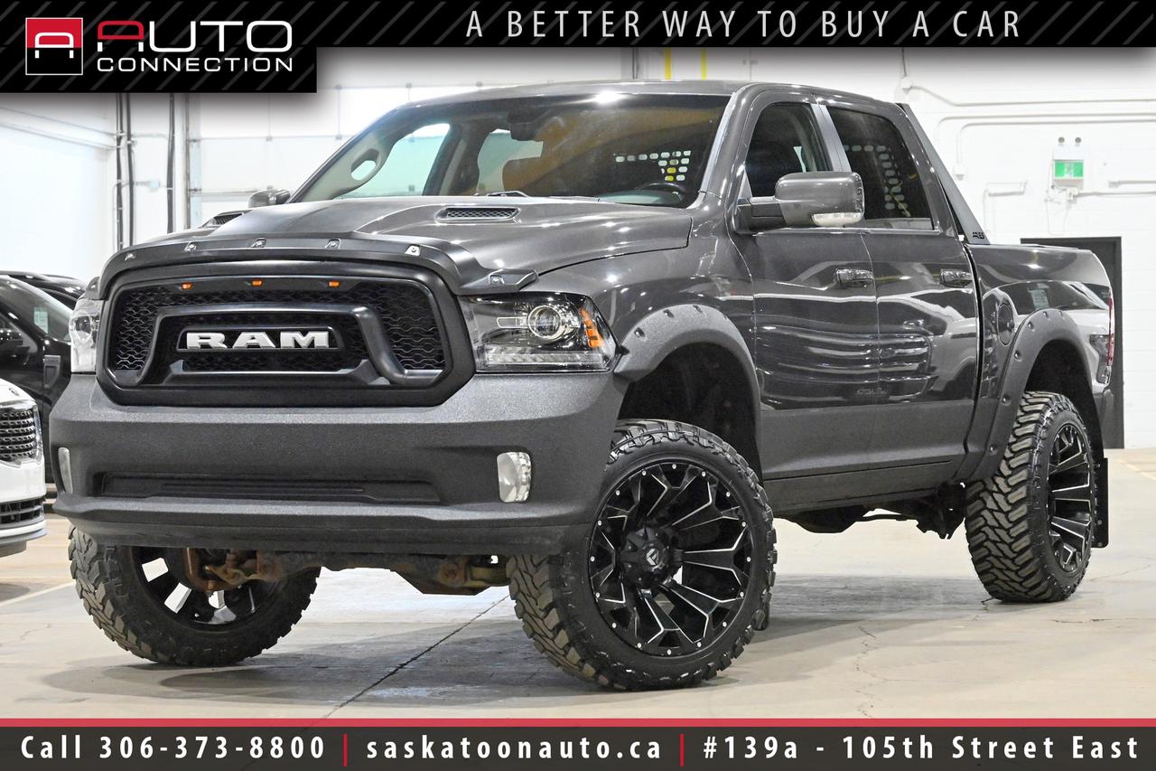<p><span><font color=#000000><span>Financing & Warranty Available!</span><span><br></span></font></span><span><br></span><span>Crew Cab w/ 5.7ft. Box - Low KMs - Regularly Maintained</span><span><br></span><span><br></span><span><b>Key Features:</b><br></span><span><br>- 4x4<br>- Sport Premium Group<br>- Convenience Group<br>- Cooled & Heated Leather Bucket Seats<br>- Heated Steering Wheel<br>- Remote Start<br>- GPS Navigation<br>- Power Moonroof<br>- 9-Speaker Alpine Premium Sound System w/ Subwoofer<br>- ParkView Rear Back-Up Camera<br>- Automatic High Beams<br>- Rain-Sensing Windshield Wipers<br>- Dual-Zone Automatic Climate Control w/ Humidity Sensor<br>- 8.4-Inch Touchscreen Display<br>- Keyless Enter n Go w/ Push-Button Start<br>- Remote Proximity Keyless Entry<br>- Power-Adjustable Front Seats<br>- Universal Garage Door Opener<br>- LED Interior Lighting<br>- Power-Folding Heated Exterior Mirrors<br>- Sport Performance Hood<br>- Spray-In Bedliner<br>- Trailer Tow Group<br>- Integrated Trailer Brake Controller<br>- 10,140lb. Towing Capacity<br>- 121-litre Fuel Tank<br>- 3.92 Rear Axle Ratio<br>- Anti-Spin Differential Rear Axle<br>- 8-Speed Automatic Transmission<br>- 5.7L HEMI 8-Cylinder Engine<br><br><b>Exterior Colour:</b> Granite Crystal Metallic<br><b>Interior Colour:</b> Black Perforated Leather<br><br><b>Manufacturers Brochure:</b> </span><a href=https://autocatalogarchive.com/wp-content/uploads/2018/06/Dodge-Ram-1500-2017-CA.pdf target=_blank><span>https://autocatalogarchive.com/wp-content/uploads/2018/06/Dodge-Ram-1500-2017-CA.pdf</span></a><span><br><br></span><span>Unlock a full year of FREE exclusive VIP benefits with your purchase! Enjoy 20% off labor, 25% off tires, free windshield stone chip repairs, and so much more. Visit saskatoonauto.ca/vip-features for all the details.<br></span><span><br>Honesty Pricing eliminates the haggle hassle by providing you with our lowest possible selling price up front. In fact, it is the lowest price in our market, and we will prove it by disclosing a comprehensive market report of what our competitors are selling similar vehicles for.<br></span><span><br>This vehicle meets our Diamond Certification standard, which begins by selecting only premium quality vehicles and subjecting them to a much more comprehensive inspection process than typical dealerships use. Diamond Certified ensures a clean history, exceptional appearance and problem-free operation.<br></span><span><br>At Saskatoon Auto Connection we sell pre-owned automobiles the way we would like to buy them ourselves. Since 2008, we have been dedicated to providing the highest level of integrity and transparency in our industry, in combination with the highest quality vehicles at the most competitive prices in Saskatchewan. Our friendly staff is ready to positively redefine your expectations of the pre-owned automobile space.</span><span></span></p>
