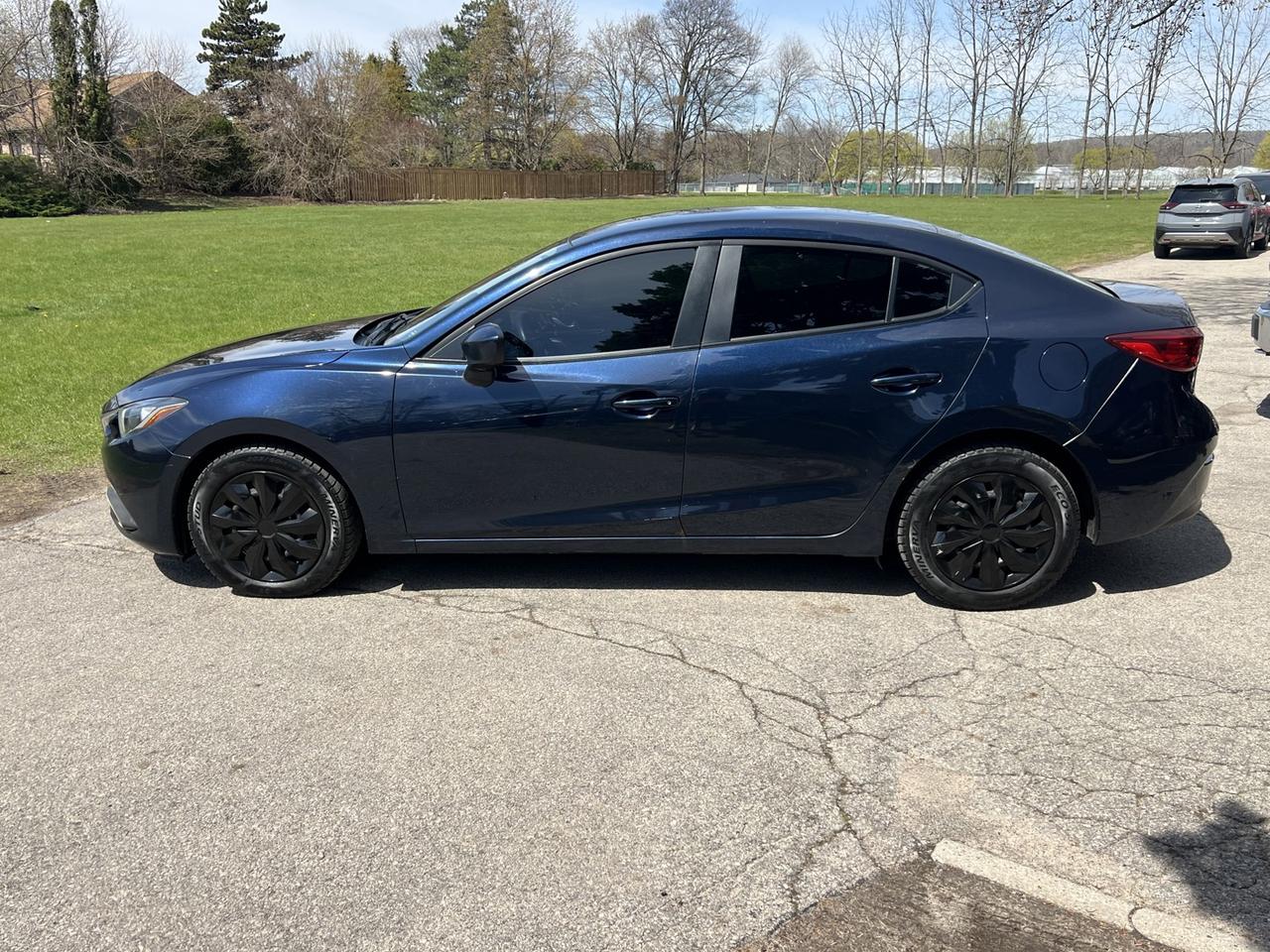2016 Mazda MAZDA3 i Sport AT 4-Door Photo