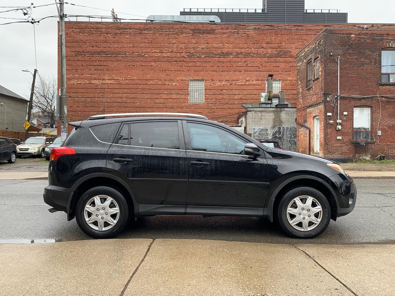2014 Toyota RAV4 AWD 4dr LE Photo