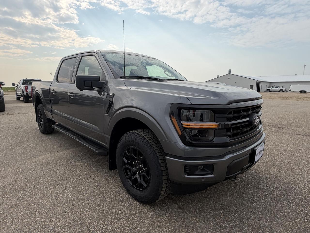 <p>The 2026 Ford F-150 XLT at Merit Ford Sales is built for those who demand more from their truck. Equipped with the powerful 5.0L V8 engine, the 302A Mid Equipment Group, and a stacked list of packages, this Crew Cab in Carbonized Grey Metallic is ready to work hard and look good doing it.<br><br>- 5.0L V8 engine paired with a 10-speed automatic transmission and 4WD serious power for serious hauling<br>- FX4 Off-Road Package for enhanced capability on any terrain<br>- Tow/Haul Package with Class IV hitch and trailer sway control built to pull<br>- XLT Black Appearance Package giving this F-150 an aggressive, blacked-out edge<br>- Bed Utility Package for versatile, organized cargo management<br>- BLIS Blind Spot Monitoring with Cross-Traffic Alert and Reverse Brake Assist for confident maneuvering<br>- Ford Connectivity Package (7-year subscription) keeping you connected on every job and road trip<br>- Drivers Side SecuriCode Keyless-Entry Keypad and engine block heater practical features for Canadian winters<br><br>Ready to make it yours? Stop by Merit Ford Sales to book a test drive, ask our team any questions, or get started on your purchase today in person or online.</p>