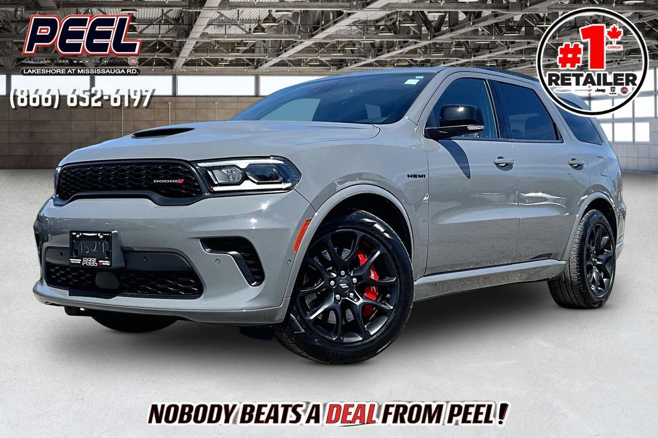 COME SEE WHY NOBODY BEATS A DEAL FROM PEEL! Your Source for ALL make and models used cars and trucks. The True #1 Stellantis Retailer in Ontario for 14 years and running!! (*)

2024 Dodge Durango R/T AWD | 5.7L HEMI V8 | Destroyer Grey | Tow n Go Group | Blacktop Package | Heated & Ventilated Nappa Leather Seats | 6 Passenger Seating w/ Second Row Captain Chairs | Uconnect 5 10.1" Display w/ Navigation | 9-speaker Alpine High Performance Audio System | Power Sunroof | High Performance Suspension | Red Brembo Brakes w/ SRT Performance Pads | High Performance Exhaust | Wireless Apple CarPlay & Android Auto | Wireless Smartphone Charging | Adaptive Cruise Control | Forward Collision Warning | Blind Spot Monitoring | Heated Steering Wheel | Remote Start | Power Liftgate | Parking Sensors

One Owner Clean Carfax

Built for the enthusiast who wants V8 attitude with real three-row practicality, this 2024 Dodge Durango R/T AWD in Destroyer Grey with the Blacktop Package and Tow N Go Group is the sweet-spot setup, powered by the 5.7L HEMI V8 delivering 360 horsepower and 390 lb-ft of torque for that unmistakable rumble and punchy mid-range pull. Inside, it feels properly upscale with heated and ventilated Nappa leather, a heated steering wheel, second-row captains chairs for true 6-passenger comfort, a power sunroof, and Uconnect 5 on the big 10.1-inch display with navigation, wireless Apple CarPlay and Android Auto, wireless charging, and a 9-speaker Alpine system that makes every drive feel like an event. The confidence tech is there for daily use too, with Adaptive Cruise Control, Forward Collision Warning, Blind Spot Monitoring, and parking sensors to take the stress out of traffic and tight lots. Where this one really separates itself is Tow N Go, adding the high-performance suspension, high-performance exhaust, an electronic limited-slip rear axle, and the serious stopping power of red Brembo brakes with SRT perforated pads, plus it unlocks Durangos max tow rating up to 8,700 lb when properly equipped, so it is ready for boats, campers, and weekend toys without stepping up to an SRT. With One Owner, Clean Carfax history, this is the dialled-in R/T that delivers the full HEMI experience, aggressive looks, and real towing capability in one highly desirable package.
______________________________________________________

Engage & Explore with Peel Chrysler: Whether youre inquiring about our latest offers or seeking guidance, 1-866-652-6197 connects you directly. Dive deeper online or connect with our team to navigate your automotive journey seamlessly.

WE TAKE ALL TRADES & CREDIT. WE SHIP ANYWHERE IN CANADA! OUR TEAM IS READY TO SERVE YOU 7 DAYS!
______________________________________________________
Our advertised prices are for consumers (i.e end users) only. 

*COMPANY DEMO - Exact mileage may differ from advertised mileage. Please contact one of our sales professionals for exact mileage.

*FREE CarFax (click the link above to check it out at no cost to you!)*

*FULLY CERTIFIED! (Have you seen some of these other dealers stating in their advertisements that certification is an additional fee? NOT HERE! Our certification is already included in our low sale prices to save you more!)

(*) Based on the Eastern Business Center National Ranking reported sales to actual customers, not including demonstrators.
______________________________________________________

Peel Chrysler  A Trusted Destination: Based in Port Credit, Ontario, we proudly serve customers from all corners of Ontario and Canada including Toronto, Oakville, North York, Richmond Hill, Ajax, Hamilton, Niagara Falls, Brampton, Thornhill, Scarborough, Vaughan, London, Windsor, Cambridge, Kitchener, Waterloo, Brantford, Sarnia, Pickering, Huntsville, Milton, Woodbridge, Maple, Aurora, Newmarket, Orangeville, Georgetown, Stouffville, Markham, North Bay, Sudbury, Barrie, Sault Ste. Marie, Parry Sound, Bracebridge, Gravenhurst, Oshawa, Ajax, Kingston, Innisfil and surrounding areas. On our website www.peelchrysler.com, you will find a vast selection of new vehicles including the new and used Ram 1500, 2500 and 3500. Chrysler Grand Caravan, Chrysler Pacifica, Jeep Cherokee, Wrangler and more. All vehicles are priced to sell. We deliver throughout Canada. website or call us 1-866-652-6197. 

Disclaimer Statement: At Peel Chrysler, your satisfaction is our priority. While many pre-owned vehicles originally come with two keys, variations may occur based on trade-ins, and all Peel Chrysler Pre-Owned Vehicles come standard with one key. Any extras provided by the previous owner will be included with your purchase, and additional keys can be bought at the time of sale. Online prices and payments are for finance purchases. Used vehicles that are being financed are subject to a $499 (^$1500 non-prime) financing fee, while cash purchases (certified cheque, bank draft, or wire transfer) on used vehicles have a $2,000 surcharge ( online price + $2,000). Cash purchases of new vehicles only incur applicable taxes and licensing fees, and those priced above $100,000 (including accessories or add-ons) are subject to a federal luxury tax. Optional finance and lease terms are available, and if trading in a vehicle with an outstanding loan balance requiring Peel Chrysler to facilitate the lien payout, a Lien Payout Fee of $349 applies. Prices, rates, and payments are subject to change without notice. While we strive for accuracy, occasional technical or human errors may occur, so we encourage verifying all vehicle details, including features, options, materials, and specifications, with a Peel Chrysler representative by contacting us or visiting our dealership. Experience seamless convenience with our nationwide delivery options. Visit our website or contact us for more details.