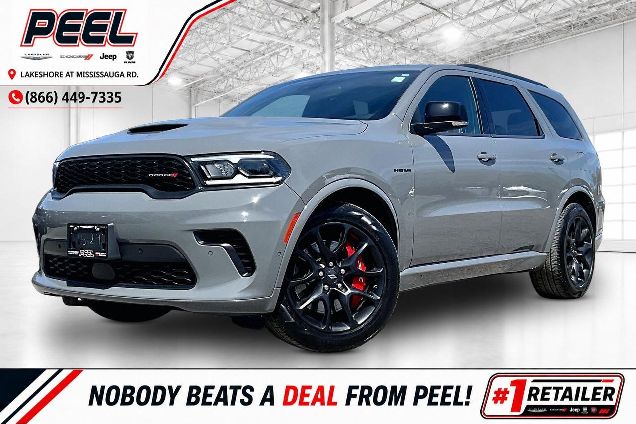 COME SEE WHY NOBODY BEATS A DEAL FROM PEEL! Your Source for ALL make and models used cars and trucks. The True #1 Stellantis Retailer in Ontario for 14 years and running!! (*)

2024 Dodge Durango R/T AWD | 5.7L HEMI V8 | Destroyer Grey | Tow n Go Group | Blacktop Package | Heated & Ventilated Nappa Leather Seats | 6 Passenger Seating w/ Second Row Captain Chairs | Uconnect 5 10.1" Display w/ Navigation | 9-speaker Alpine High Performance Audio System | Power Sunroof | High Performance Suspension | Red Brembo Brakes w/ SRT Performance Pads | High Performance Exhaust | Wireless Apple CarPlay & Android Auto | Wireless Smartphone Charging | Adaptive Cruise Control | Forward Collision Warning | Blind Spot Monitoring | Heated Steering Wheel | Remote Start | Power Liftgate | Parking Sensors

One Owner Clean Carfax

Built for the enthusiast who wants V8 attitude with real three-row practicality, this 2024 Dodge Durango R/T AWD in Destroyer Grey with the Blacktop Package and Tow N Go Group is the sweet-spot setup, powered by the 5.7L HEMI V8 delivering 360 horsepower and 390 lb-ft of torque for that unmistakable rumble and punchy mid-range pull. Inside, it feels properly upscale with heated and ventilated Nappa leather, a heated steering wheel, second-row captains chairs for true 6-passenger comfort, a power sunroof, and Uconnect 5 on the big 10.1-inch display with navigation, wireless Apple CarPlay and Android Auto, wireless charging, and a 9-speaker Alpine system that makes every drive feel like an event. The confidence tech is there for daily use too, with Adaptive Cruise Control, Forward Collision Warning, Blind Spot Monitoring, and parking sensors to take the stress out of traffic and tight lots. Where this one really separates itself is Tow N Go, adding the high-performance suspension, high-performance exhaust, an electronic limited-slip rear axle, and the serious stopping power of red Brembo brakes with SRT perforated pads, plus it unlocks Durangos max tow rating up to 8,700 lb when properly equipped, so it is ready for boats, campers, and weekend toys without stepping up to an SRT. With One Owner, Clean Carfax history, this is the dialled-in R/T that delivers the full HEMI experience, aggressive looks, and real towing capability in one highly desirable package.
______________________________________________________

Engage & Explore with Peel Chrysler: Whether youre inquiring about our latest offers or seeking guidance, 1-866-652-6197 connects you directly. Dive deeper online or connect with our team to navigate your automotive journey seamlessly.

WE TAKE ALL TRADES & CREDIT. WE SHIP ANYWHERE IN CANADA! OUR TEAM IS READY TO SERVE YOU 7 DAYS!
______________________________________________________
Our advertised prices are for consumers (i.e end users) only. 

*COMPANY DEMO - Exact mileage may differ from advertised mileage. Please contact one of our sales professionals for exact mileage.

*FREE CarFax (click the link above to check it out at no cost to you!)*

*FULLY CERTIFIED! (Have you seen some of these other dealers stating in their advertisements that certification is an additional fee? NOT HERE! Our certification is already included in our low sale prices to save you more!)

(*) Based on the Eastern Business Center National Ranking reported sales to actual customers, not including demonstrators.
______________________________________________________

Peel Chrysler  A Trusted Destination: Based in Port Credit, Ontario, we proudly serve customers from all corners of Ontario and Canada including Toronto, Oakville, North York, Richmond Hill, Ajax, Hamilton, Niagara Falls, Brampton, Thornhill, Scarborough, Vaughan, London, Windsor, Cambridge, Kitchener, Waterloo, Brantford, Sarnia, Pickering, Huntsville, Milton, Woodbridge, Maple, Aurora, Newmarket, Orangeville, Georgetown, Stouffville, Markham, North Bay, Sudbury, Barrie, Sault Ste. Marie, Parry Sound, Bracebridge, Gravenhurst, Oshawa, Ajax, Kingston, Innisfil and surrounding areas. On our website www.peelchrysler.com, you will find a vast selection of new vehicles including the new and used Ram 1500, 2500 and 3500. Chrysler Grand Caravan, Chrysler Pacifica, Jeep Cherokee, Wrangler and more. All vehicles are priced to sell. We deliver throughout Canada. website or call us 1-866-652-6197. 

Disclaimer Statement: At Peel Chrysler, your satisfaction is our priority. While many pre-owned vehicles originally come with two keys, variations may occur based on trade-ins, and all Peel Chrysler Pre-Owned Vehicles come standard with one key. Any extras provided by the previous owner will be included with your purchase, and additional keys can be bought at the time of sale. Online prices and payments are for finance purchases. Used vehicles that are being financed are subject to a $499 (^$1500 non-prime) financing fee, while cash purchases (certified cheque, bank draft, or wire transfer) on used vehicles have a $2,000 surcharge ( online price + $2,000). Cash purchases of new vehicles only incur applicable taxes and licensing fees, and those priced above $100,000 (including accessories or add-ons) are subject to a federal luxury tax. Optional finance and lease terms are available, and if trading in a vehicle with an outstanding loan balance requiring Peel Chrysler to facilitate the lien payout, a Lien Payout Fee of $349 applies. Prices, rates, and payments are subject to change without notice. While we strive for accuracy, occasional technical or human errors may occur, so we encourage verifying all vehicle details, including features, options, materials, and specifications, with a Peel Chrysler representative by contacting us or visiting our dealership. Experience seamless convenience with our nationwide delivery options. Visit our website or contact us for more details.
