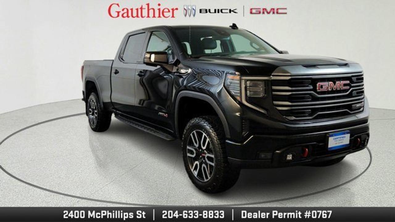 The 2022 GMC Sierra 1500 AT4 is an off-road-focused full-size pickup that combines rugged capability with premium features. It offers a 3.0-liter Duramax diesel engine (277 hp, 460 lb-ft), along with strong towing capacity of up to about 9,100 lbs. It comes equipped with specialized off-road hardware such as a factory 2-inch suspension lift, skid plates, all-terrain tires, a two-speed transfer case, hill descent control, and an automatic locking rear differential for enhanced trail performance. Inside, it balances utility with comfort through features like a touchscreen infotainment system with Apple CarPlay and Android Auto, dual-zone climate control, heated seats and steering wheel, and a suite of driver-assistance technologies for added convenience and safety.